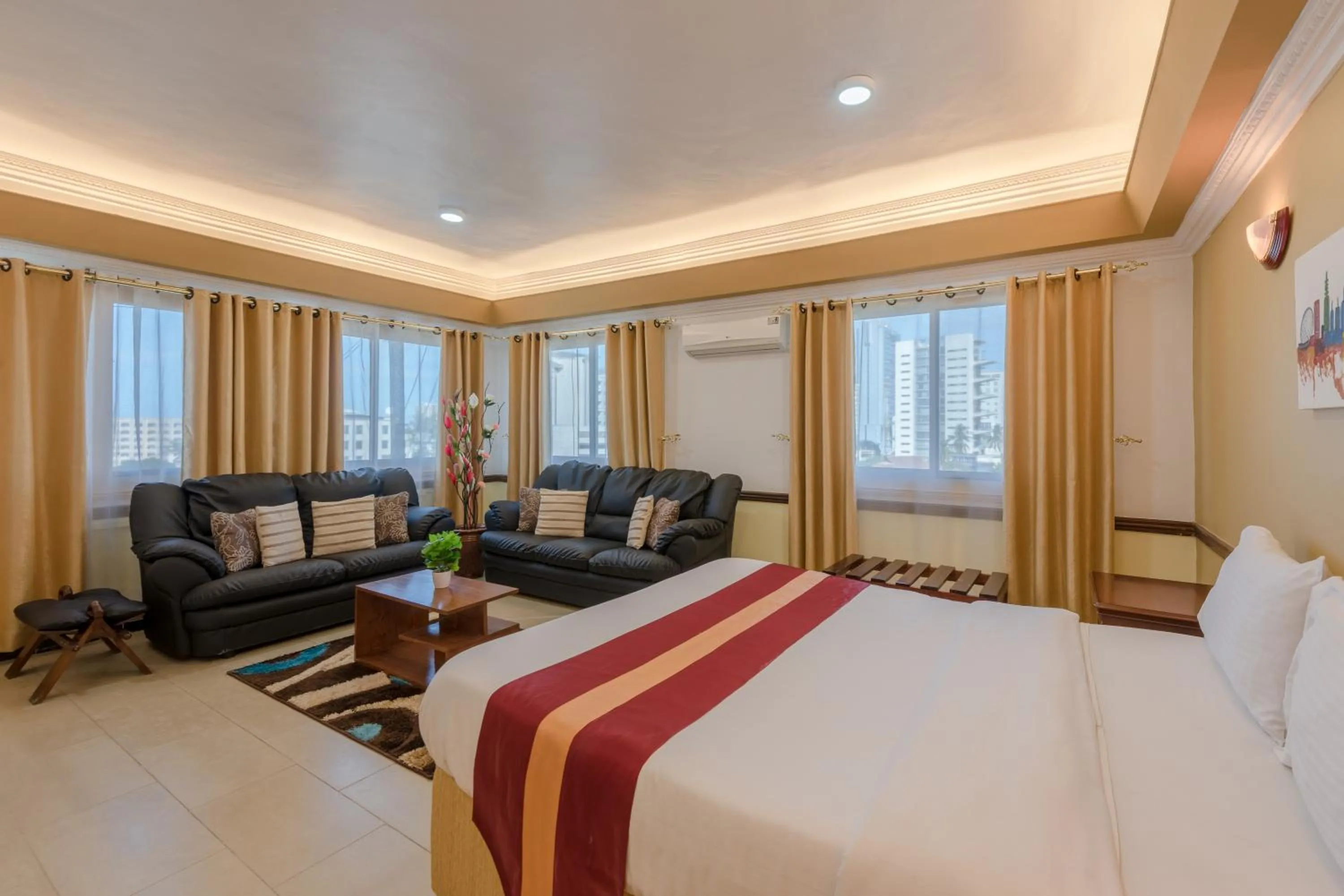 Bed in Hotel Raha Tower