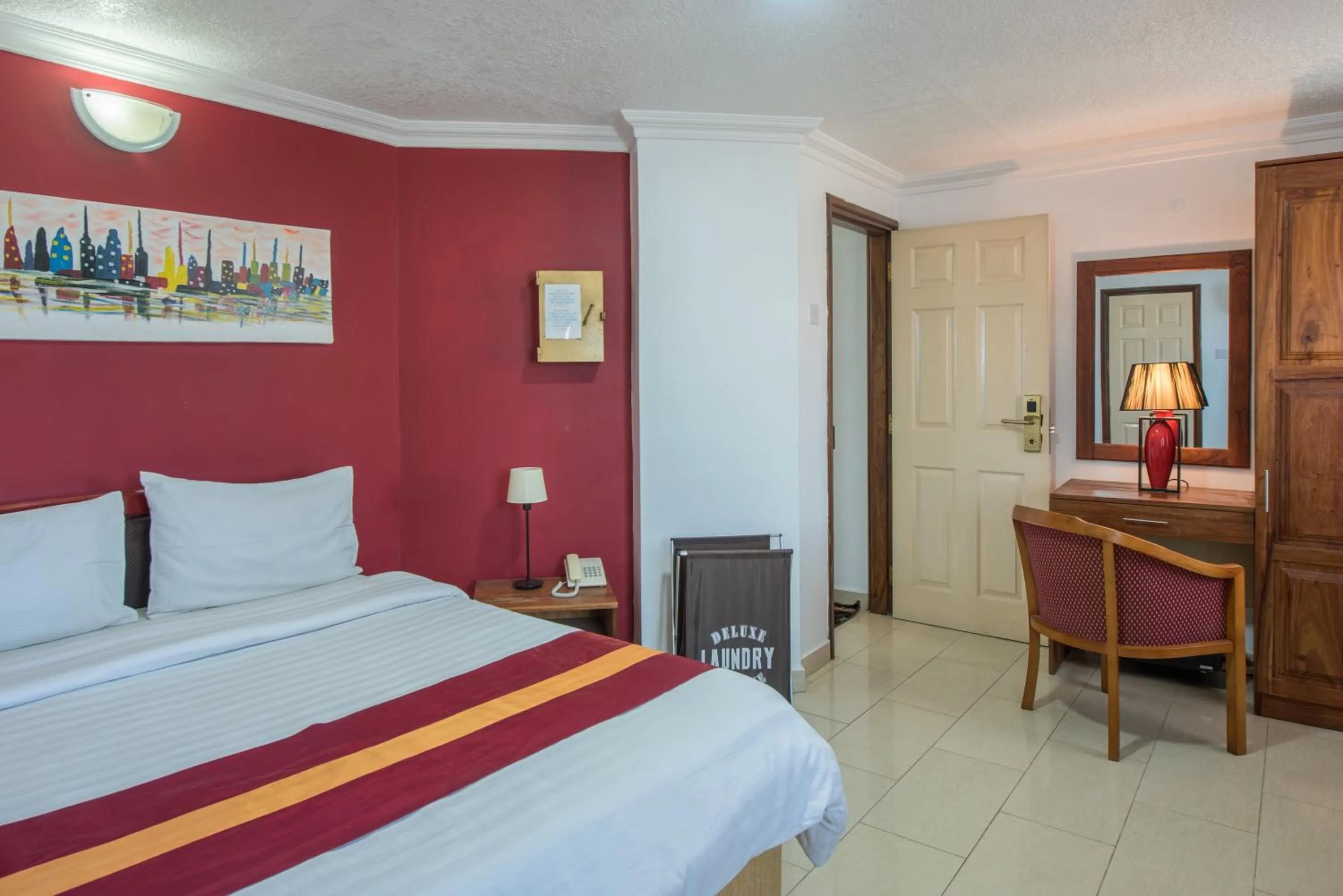 Bed in Hotel Raha Tower