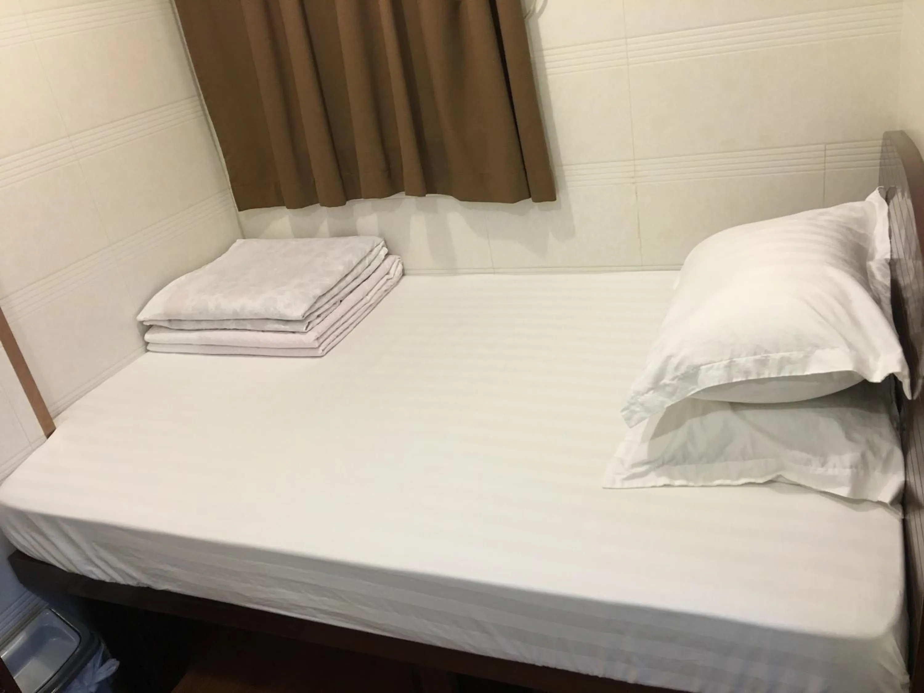 Bed in Hk Peace Guest House