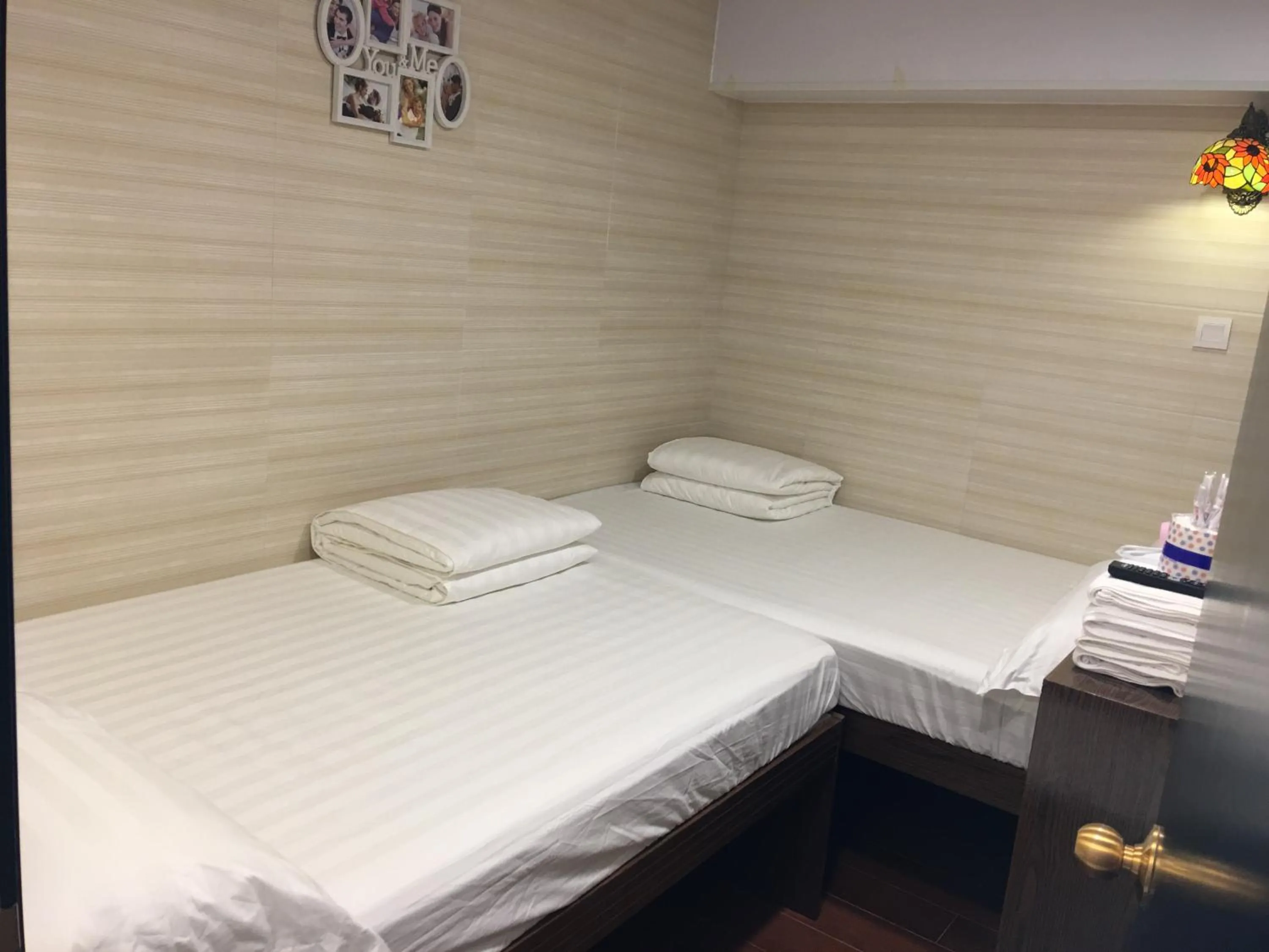 Bed in Hk Peace Guest House