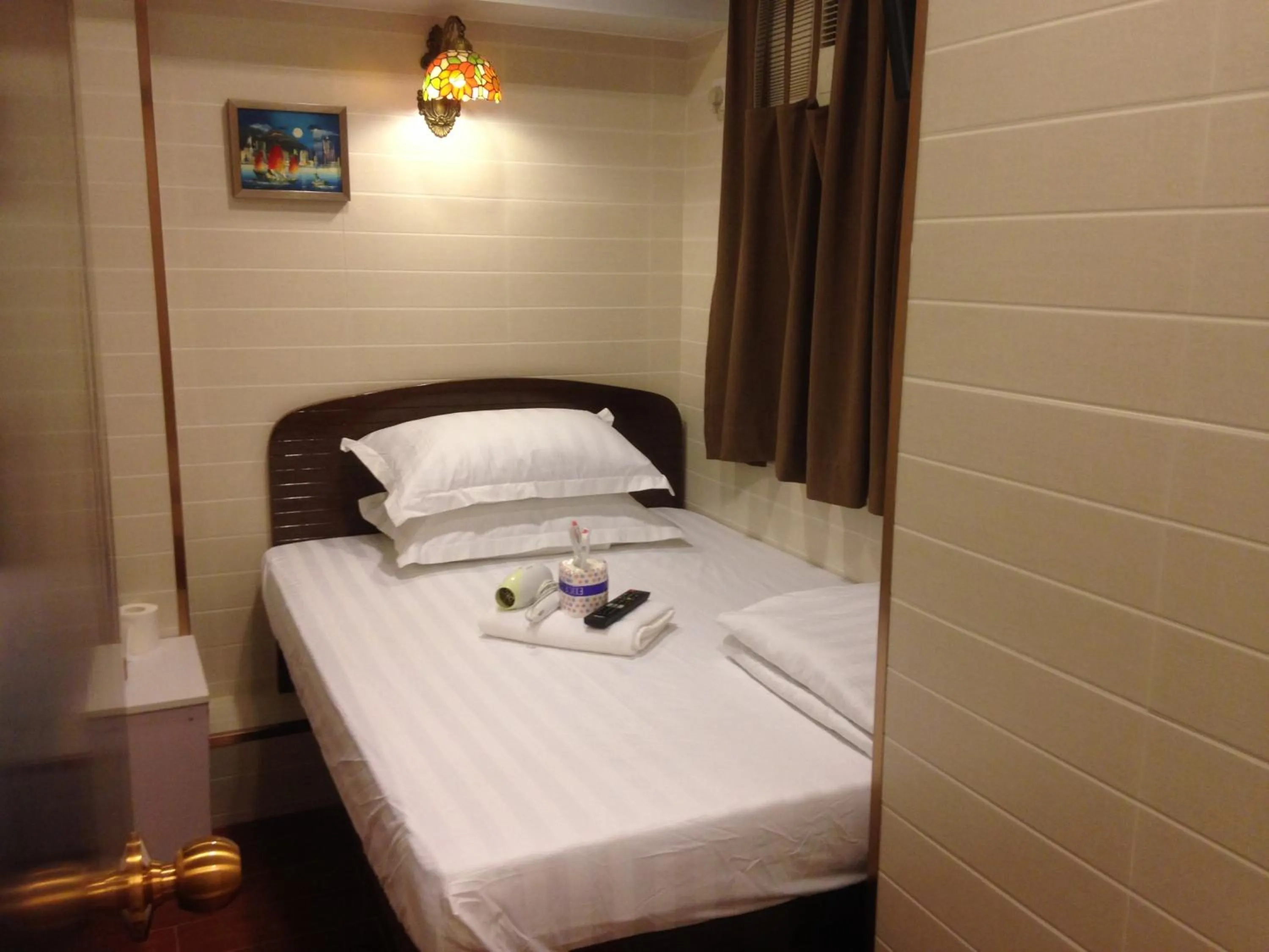 Bed in Hk Peace Guest House