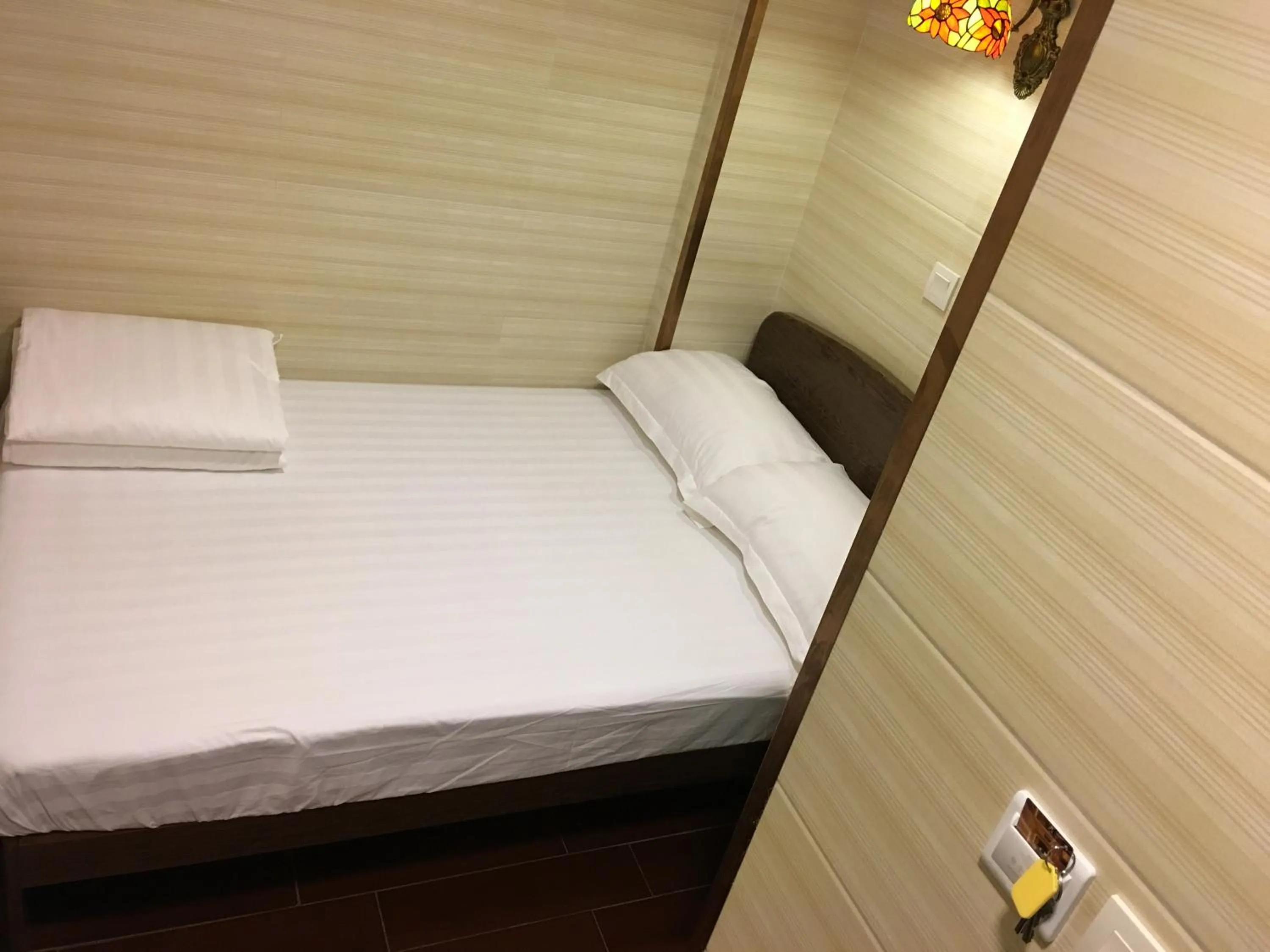 Bed in Hk Peace Guest House