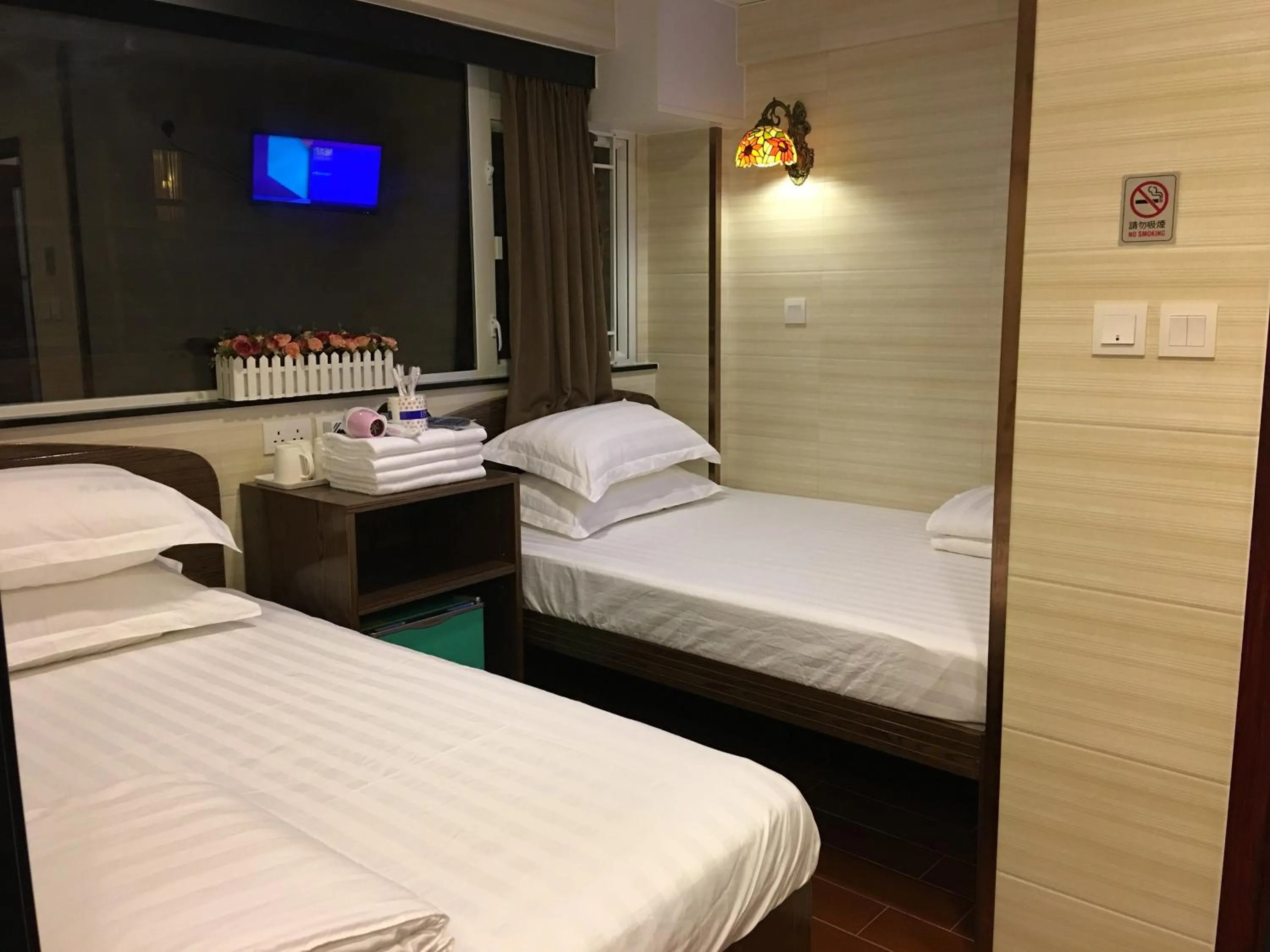 Bed in Hk Peace Guest House