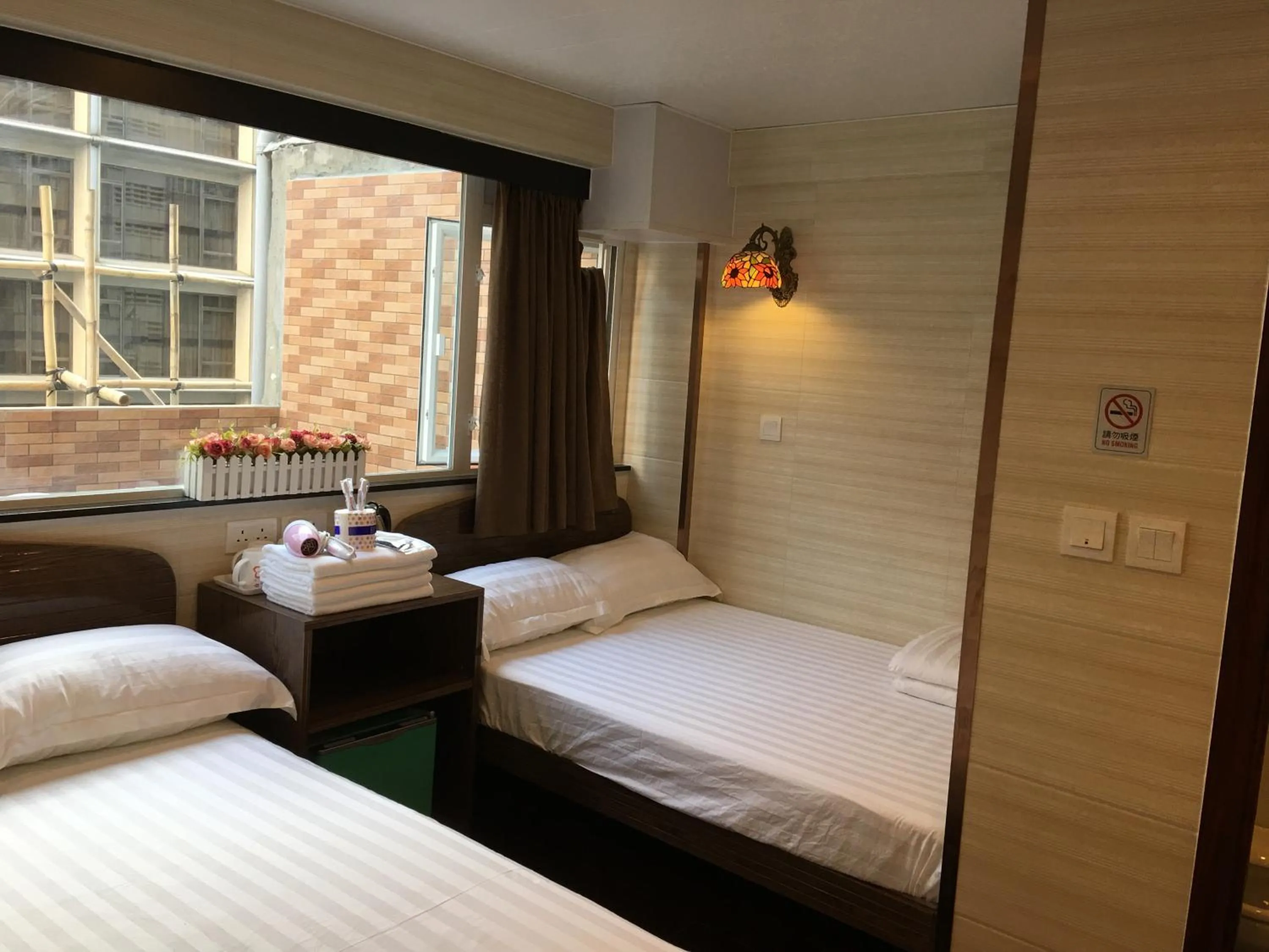 Bed in Hk Peace Guest House