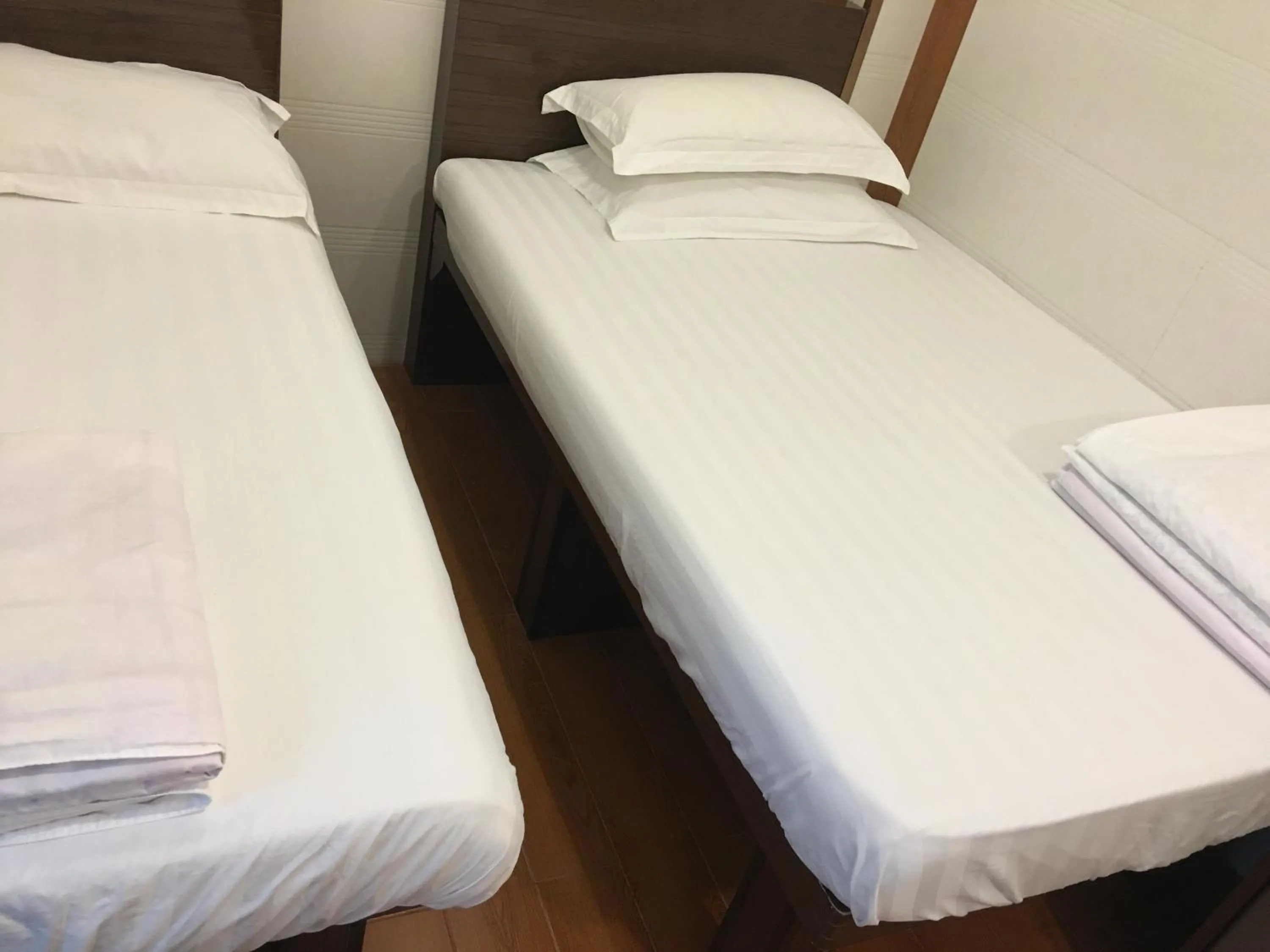 Bed in Hk Peace Guest House