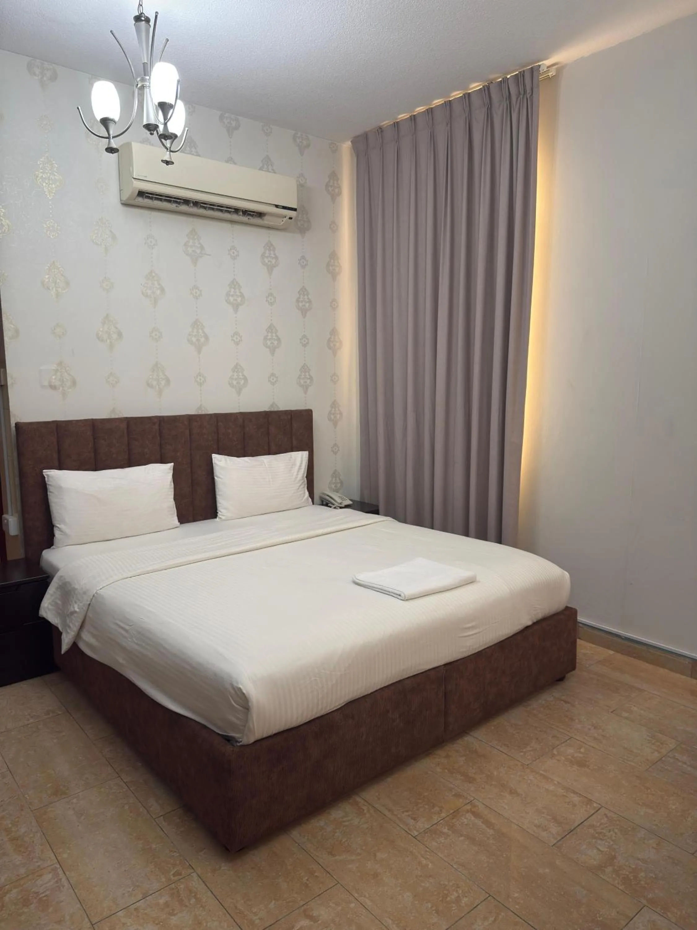 Bed in Al zain hotel apartment