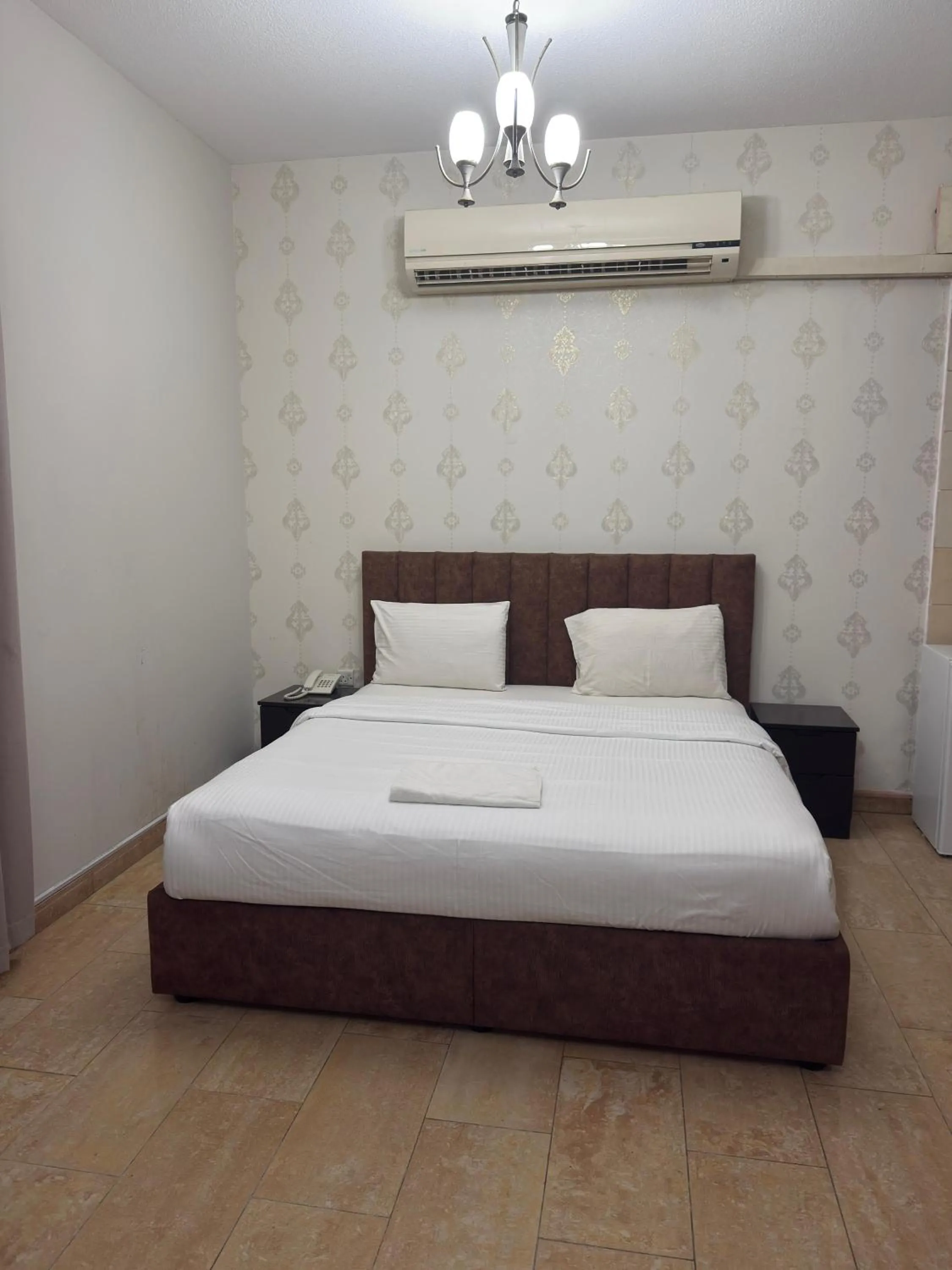 Bed in Al zain hotel apartment