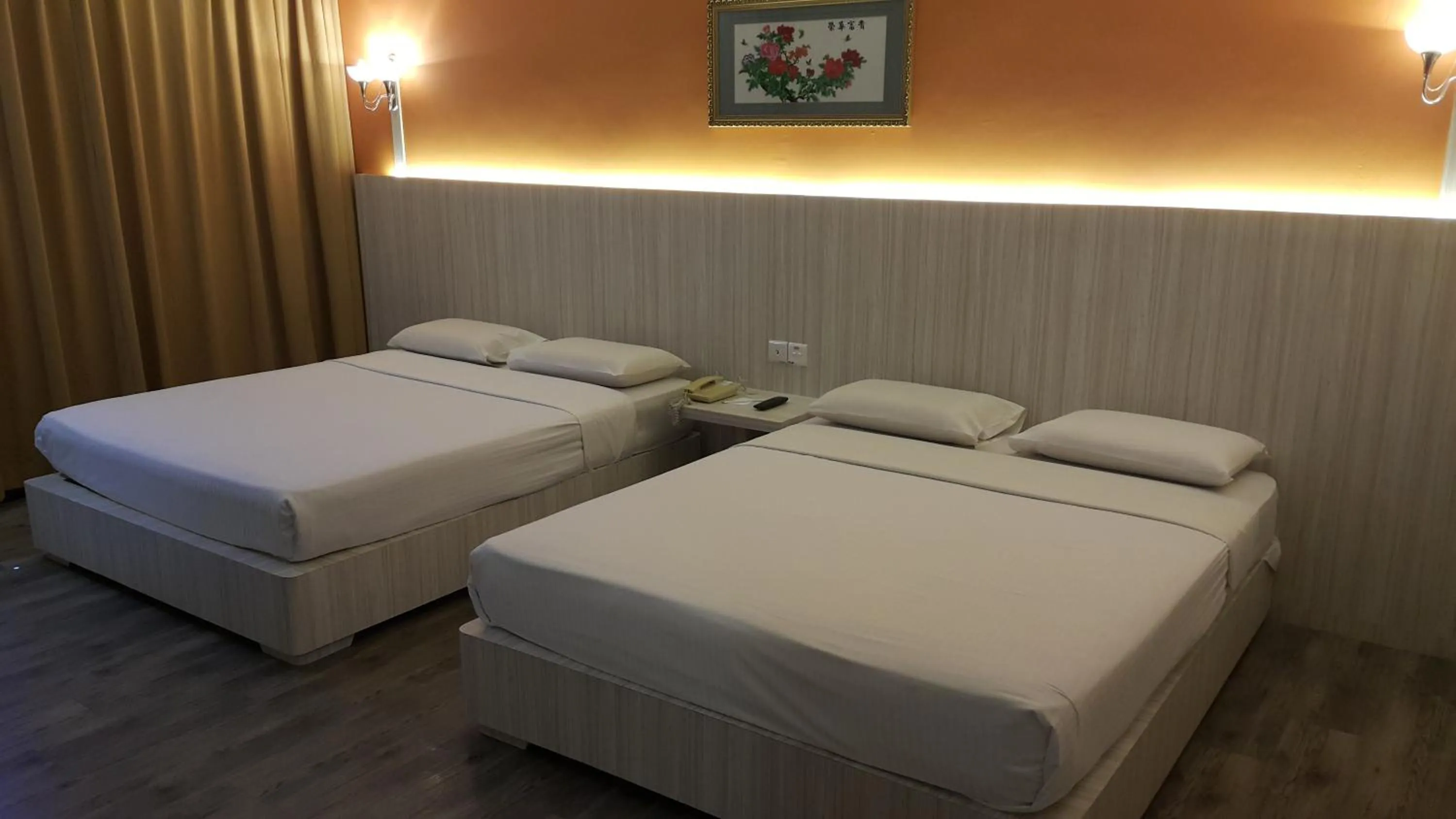 Bed in Red Rock Hotel Penang