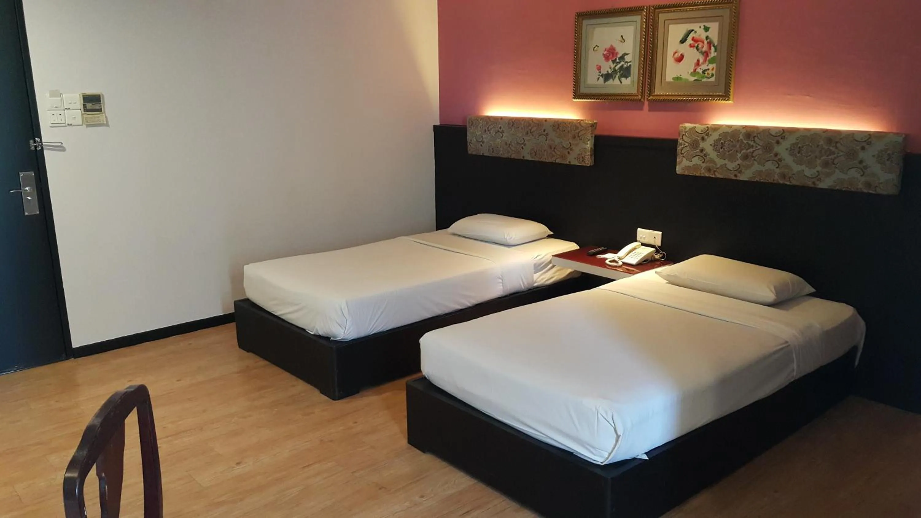 Bed in Red Rock Hotel Penang