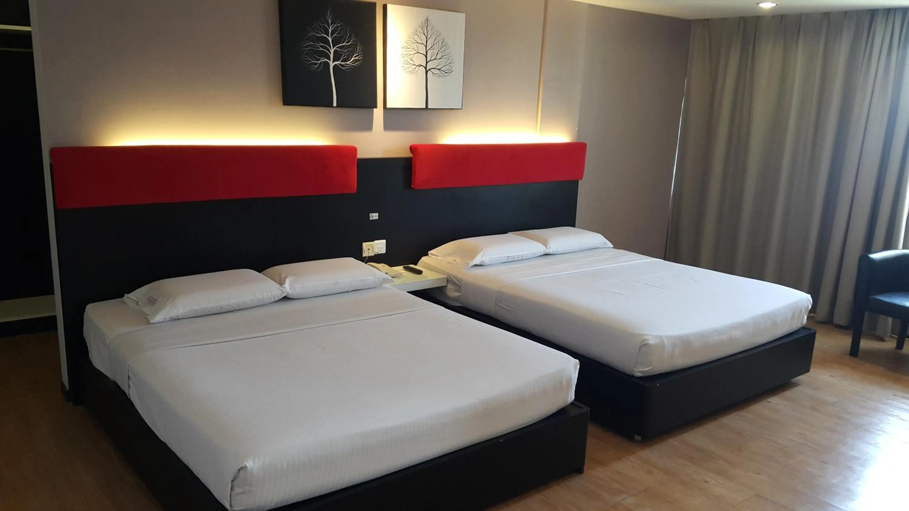 Bed in Red Rock Hotel Penang