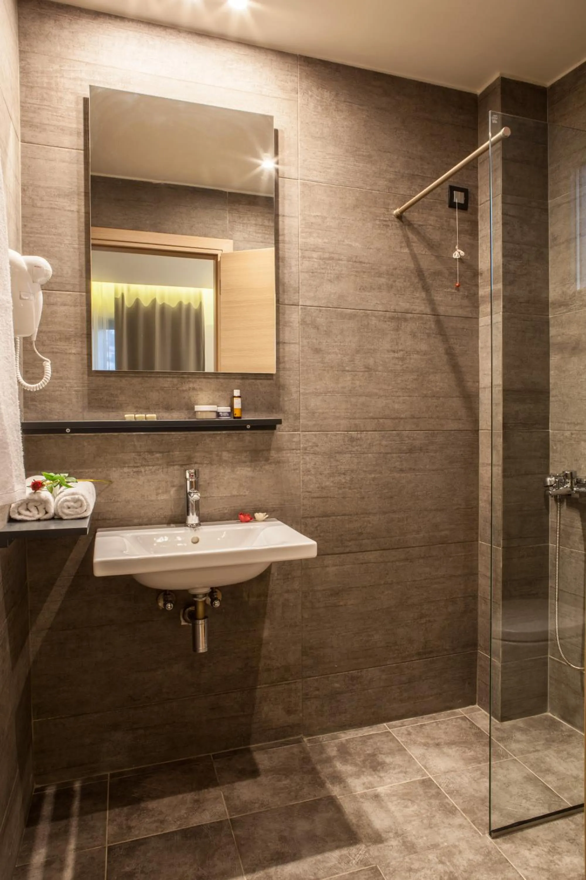 Bathroom in Anemos Rooms & Apartments