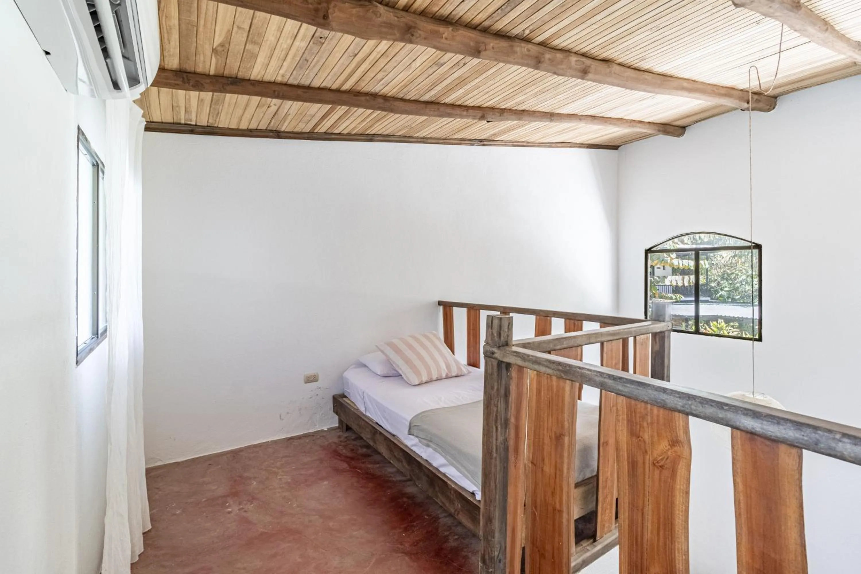 Bed in Believe Surf & Yoga Lodge Santa Teresa