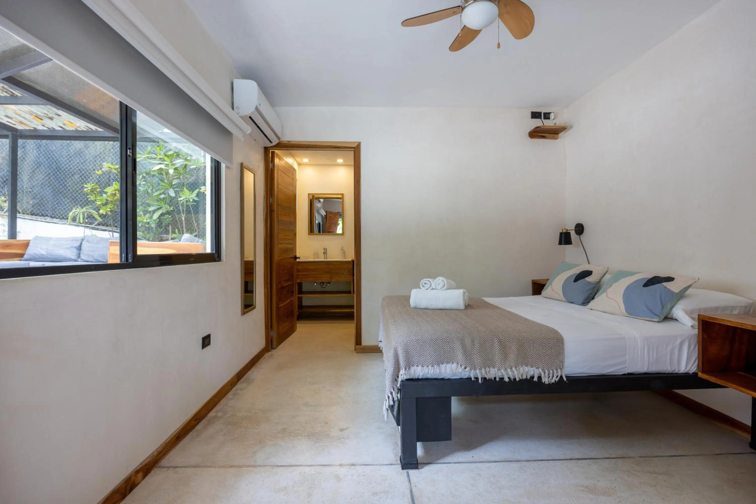 Photo of the whole room, Bed in Believe Surf & Yoga Lodge Santa Teresa