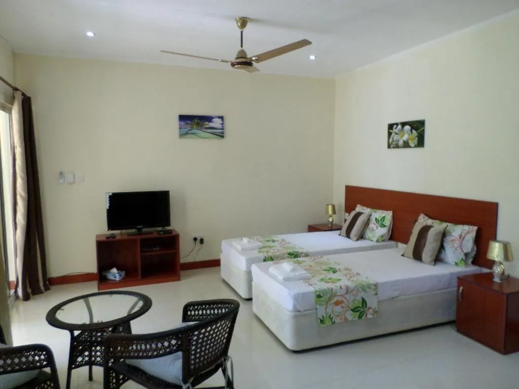 Photo of the whole room, Bed in Precious Residence C