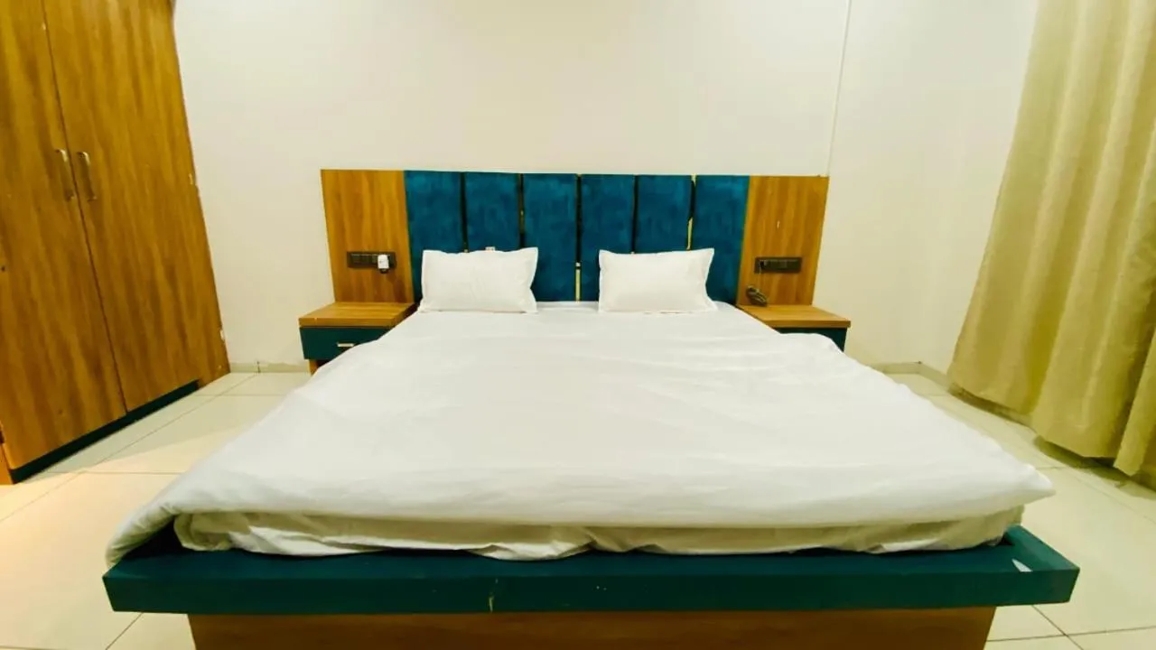 Bed in Hotel Madhushree