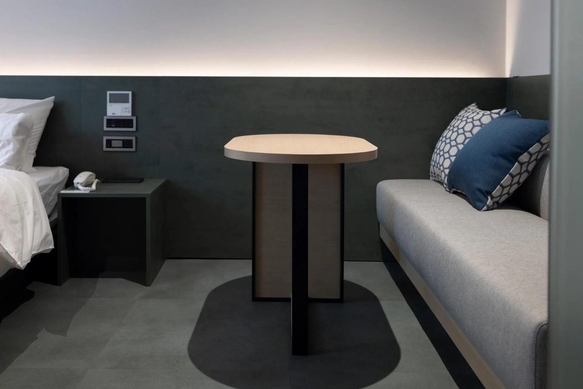 Seating area, Bed in Anook Hotel Suwon Station