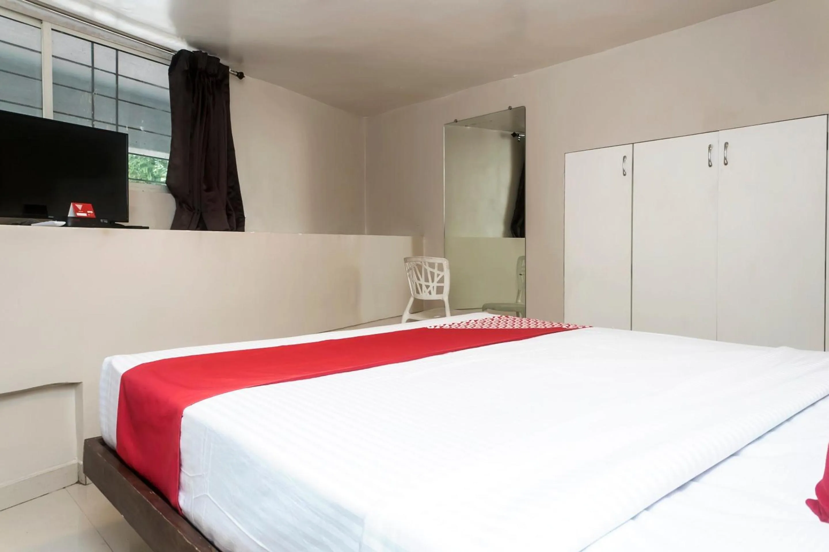 Bedroom in Hotel O Grand Pune