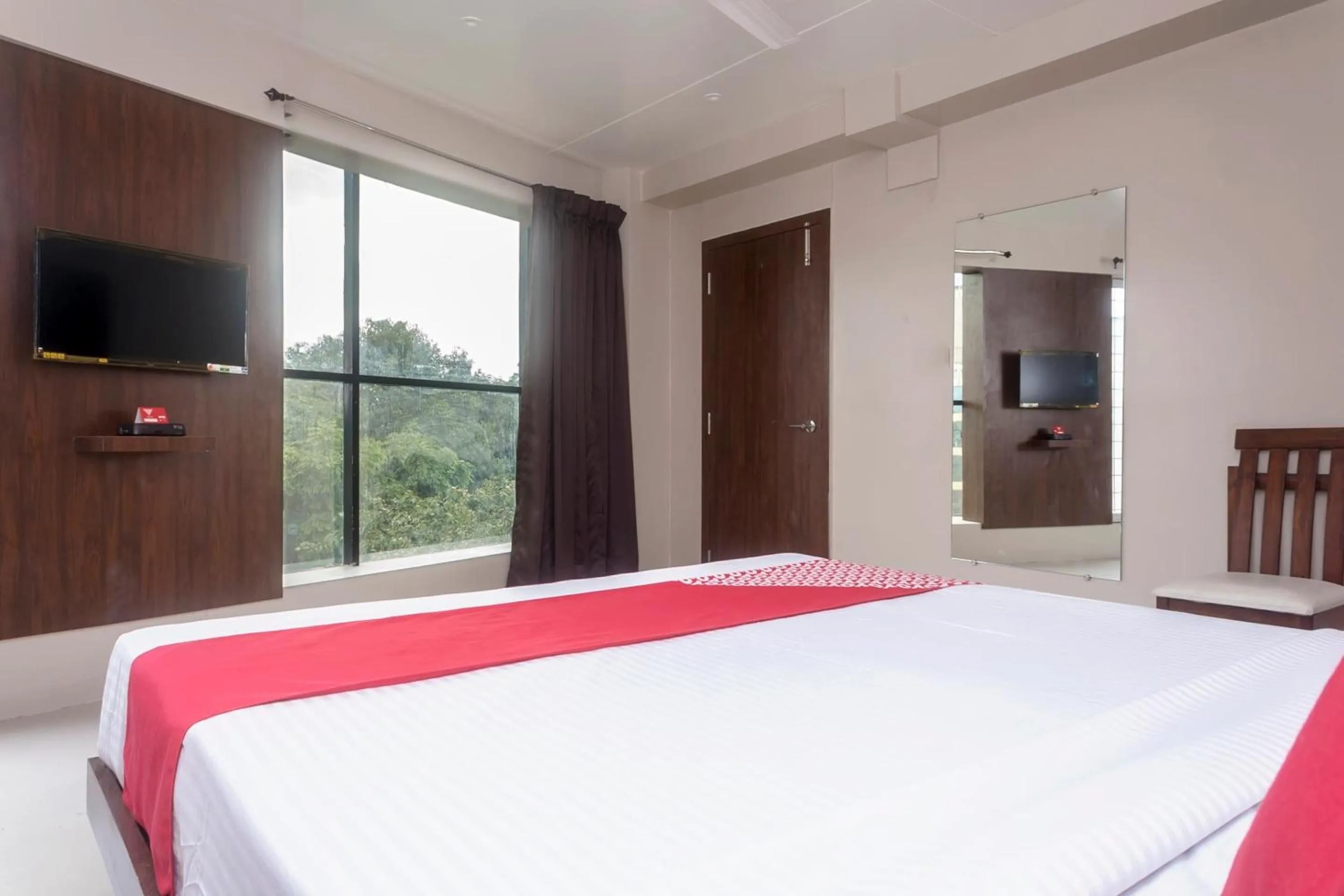 Bedroom in Hotel O Grand Pune