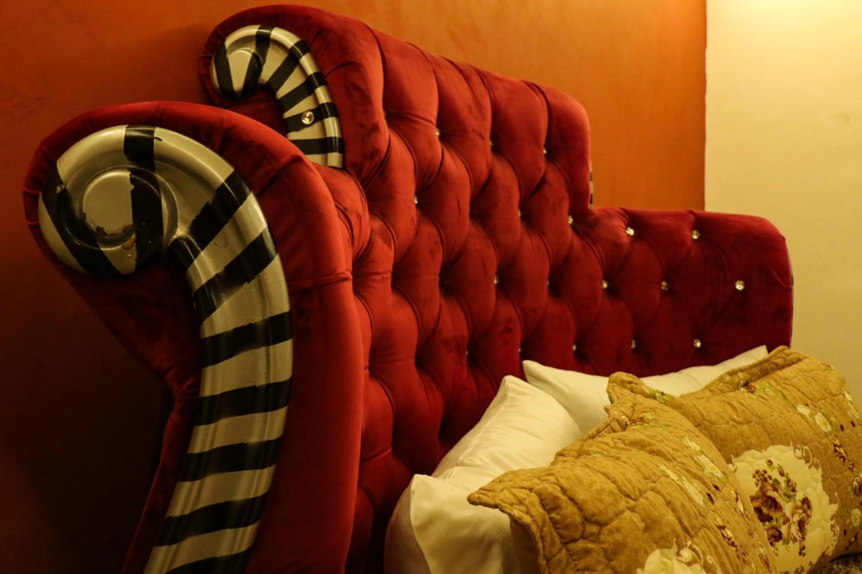 Bed in Grand Suites Hotel