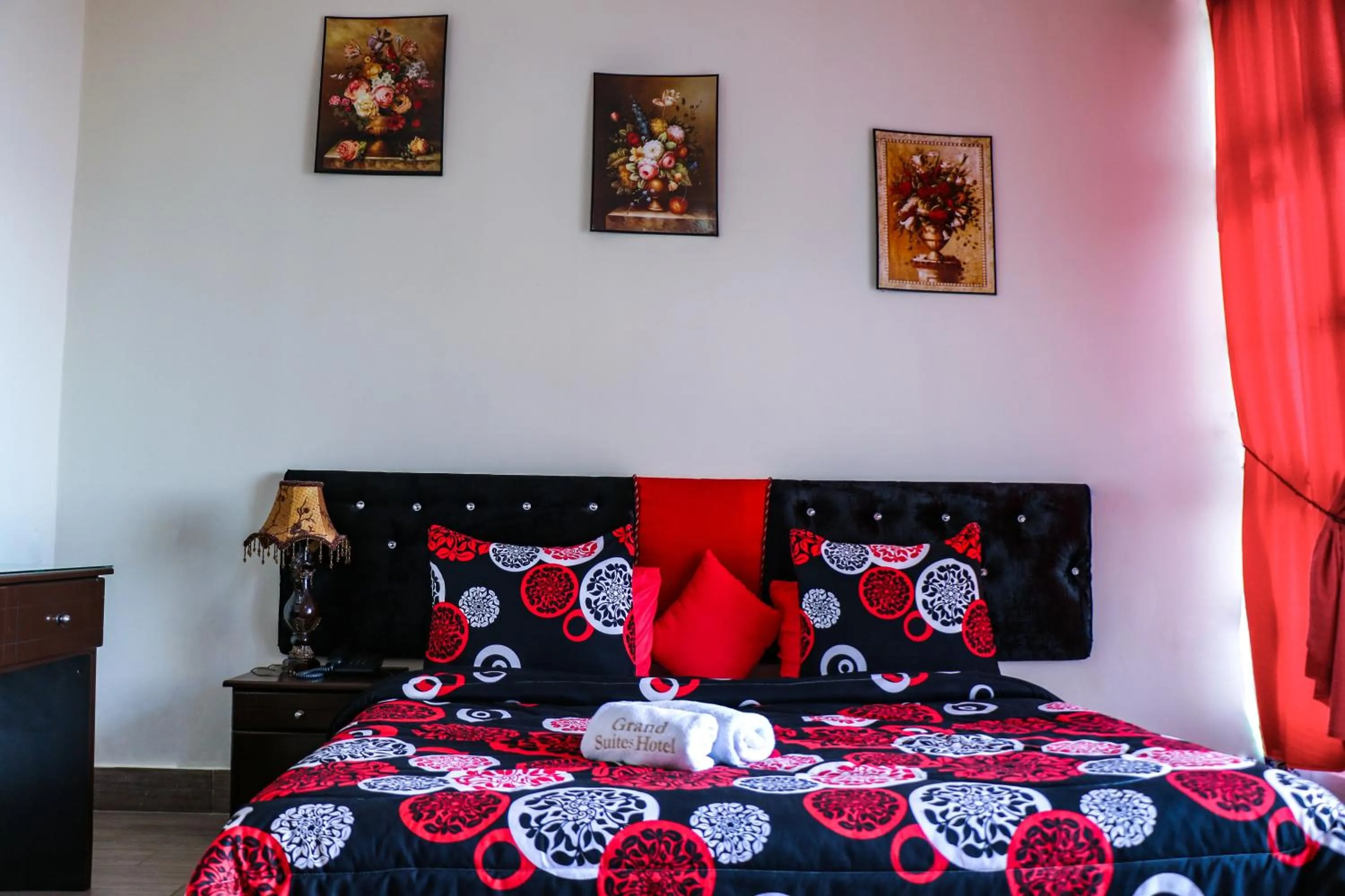 Bed in Grand Suites Hotel