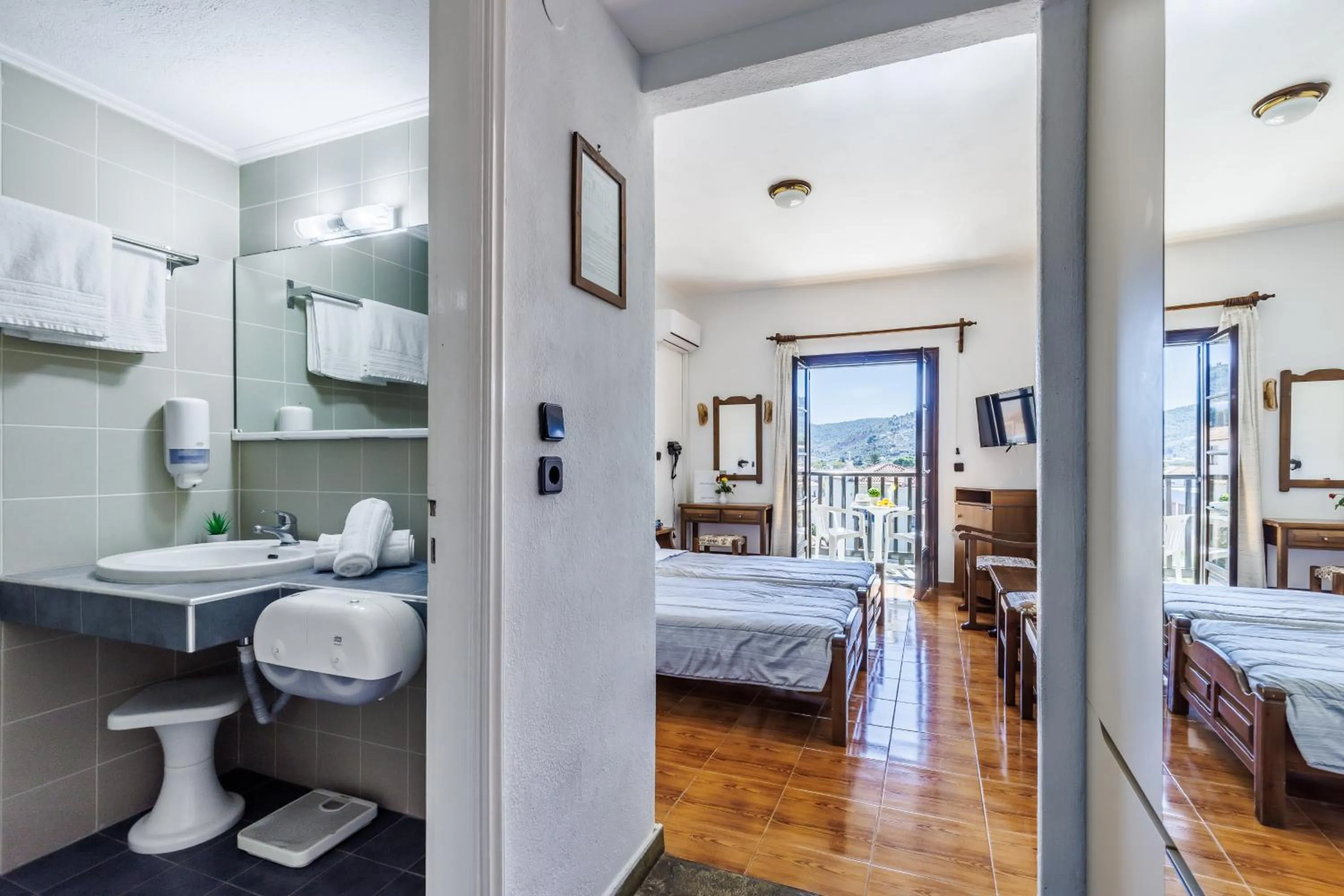 Bed in Hotel Dionyssos