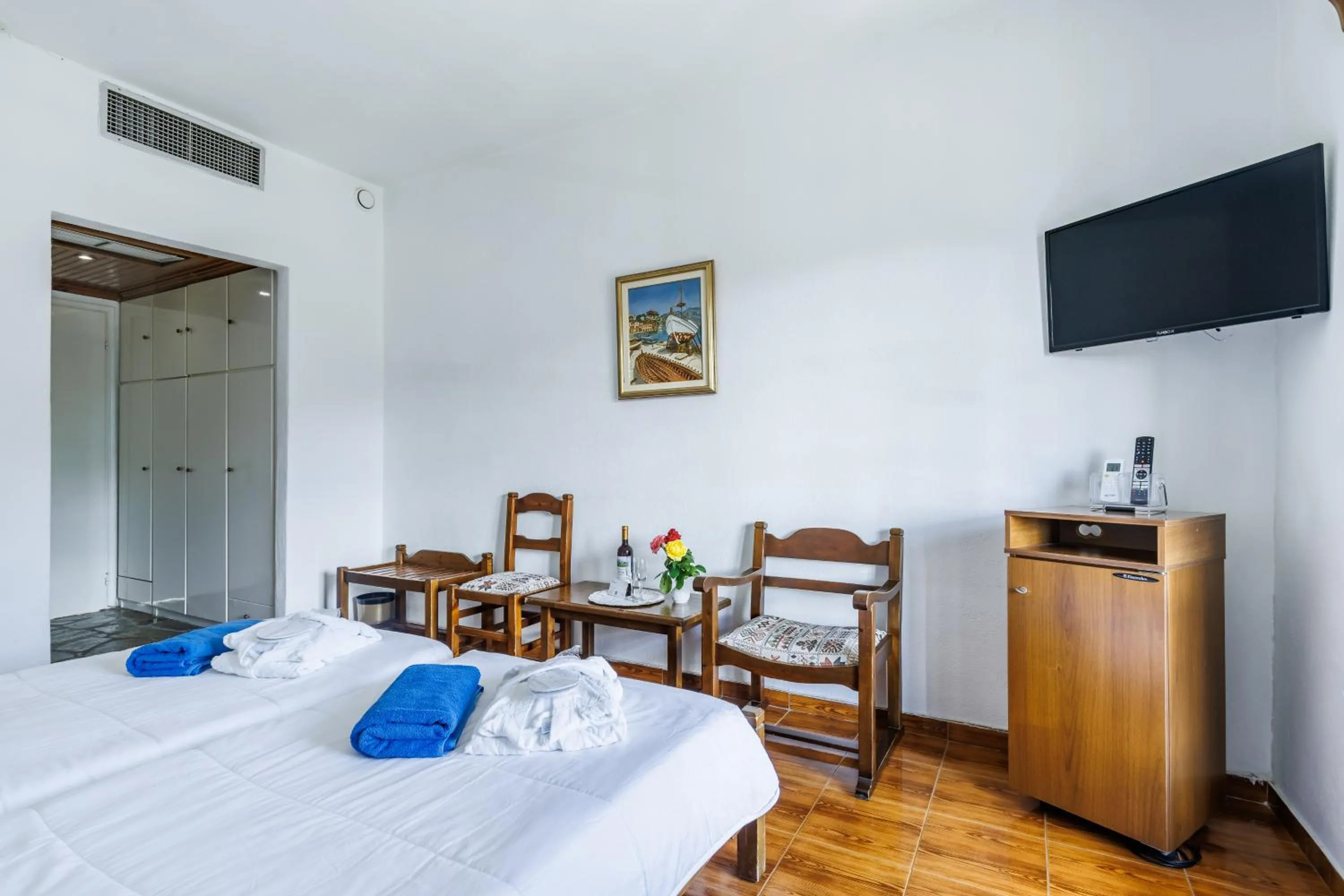 Bed in Hotel Dionyssos