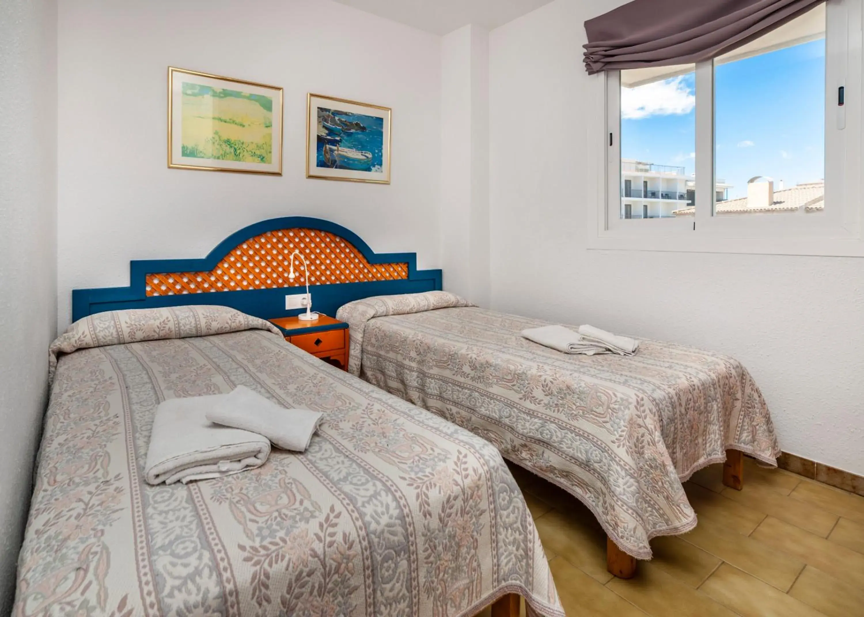 Bed in Apartamentos Charlys Can Picafort Bed in Apartamentos Charlys Can Picafort