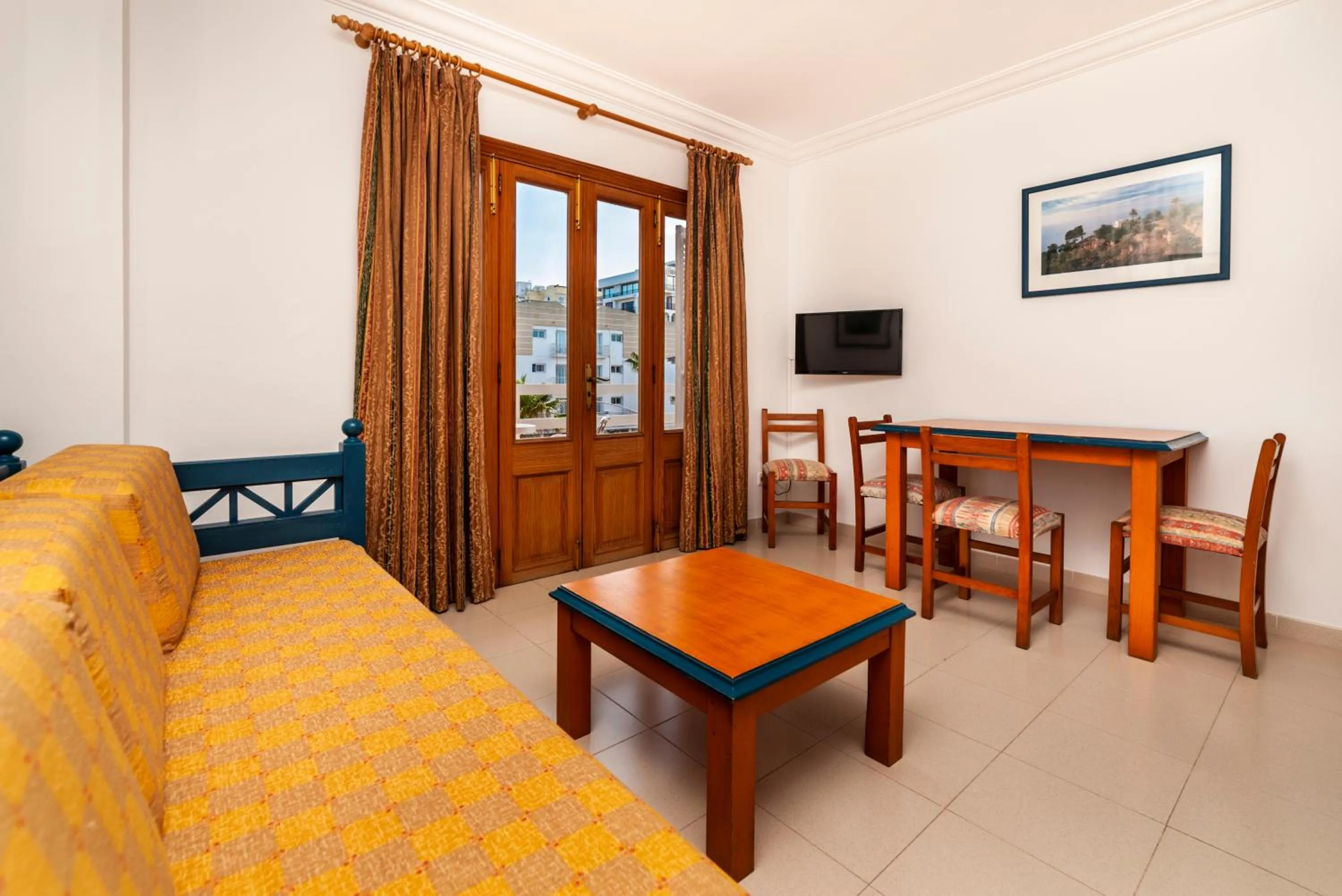 Living room in Apartamentos Charlys Can Picafort