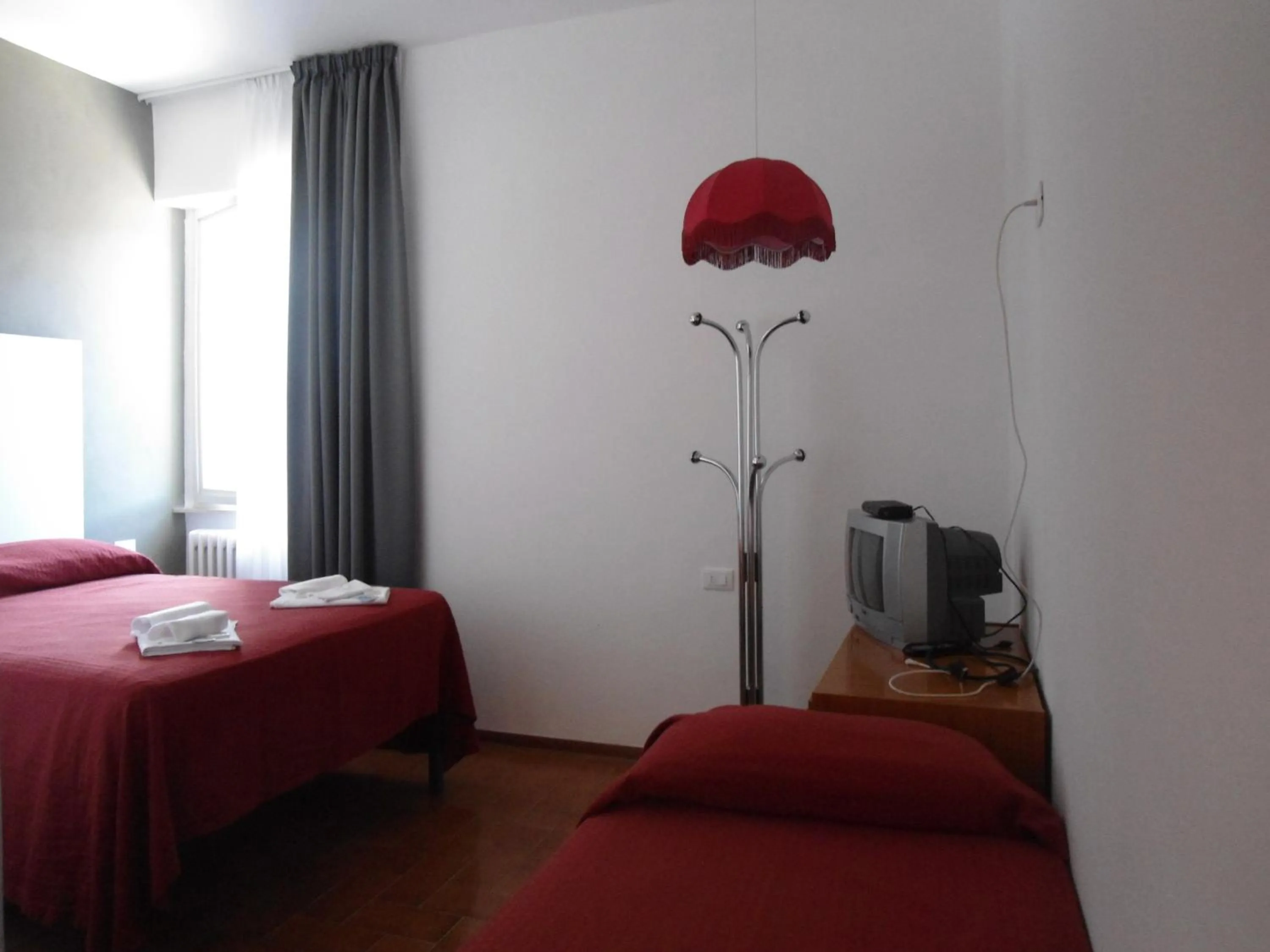 Bedroom in Hotel Piccola Firenze