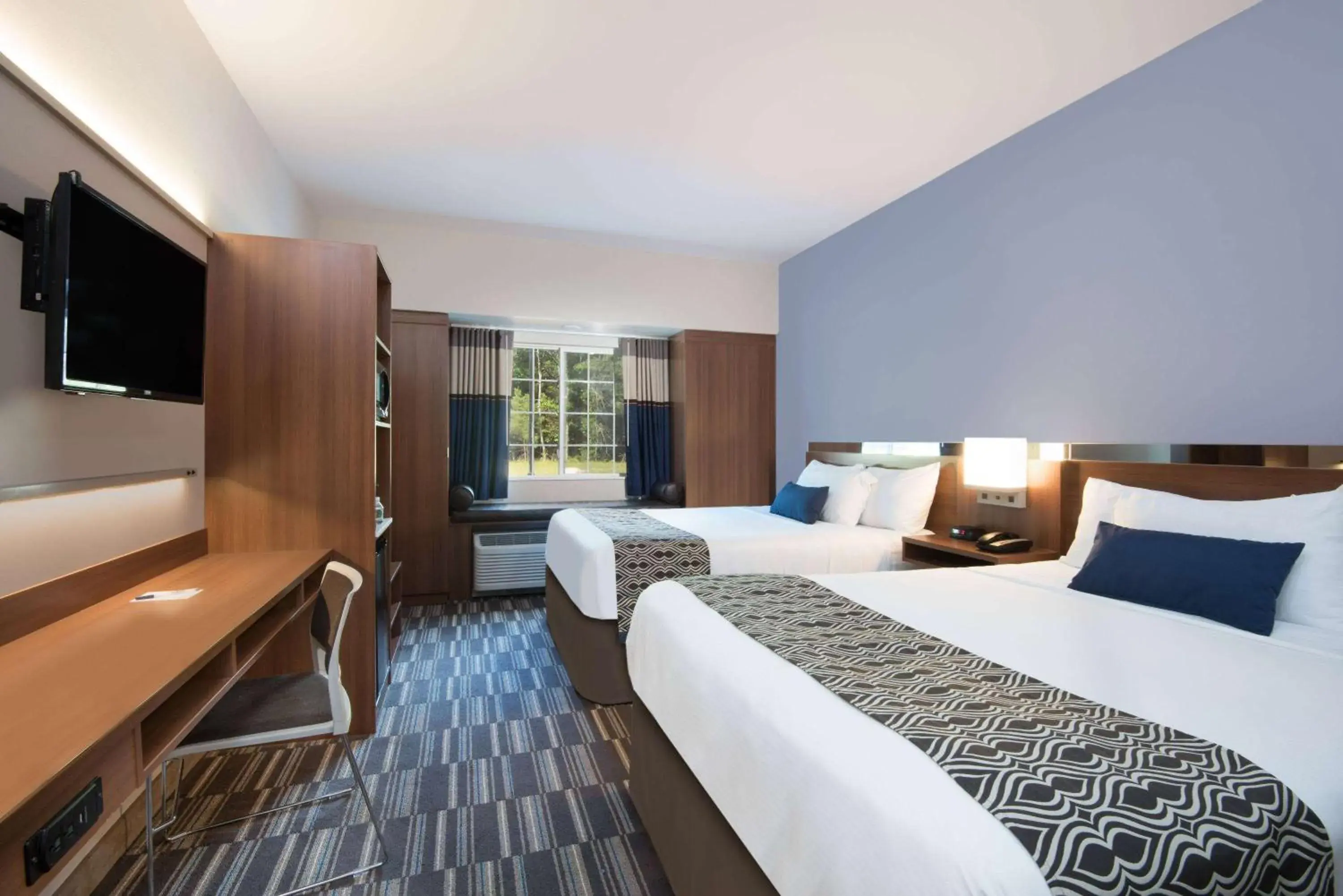 Photo of the whole room, Bed in Microtel Inn & Suites Windham Photo of the whole room, Bed in Microtel Inn & Suites Windham