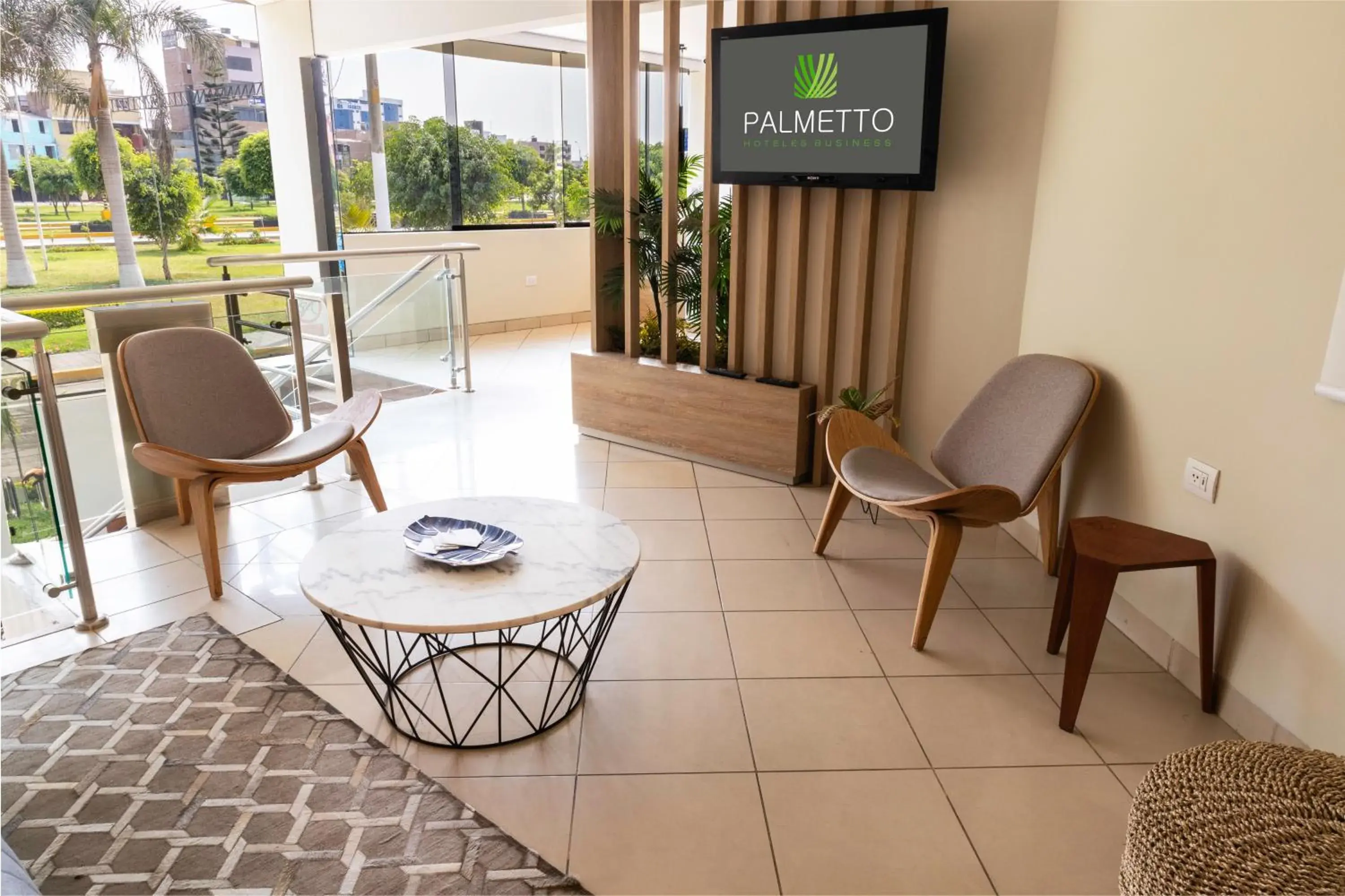 Lobby or reception in Palmetto Hotel Business La Perla Lobby or reception in Palmetto Hotel Business La Perla