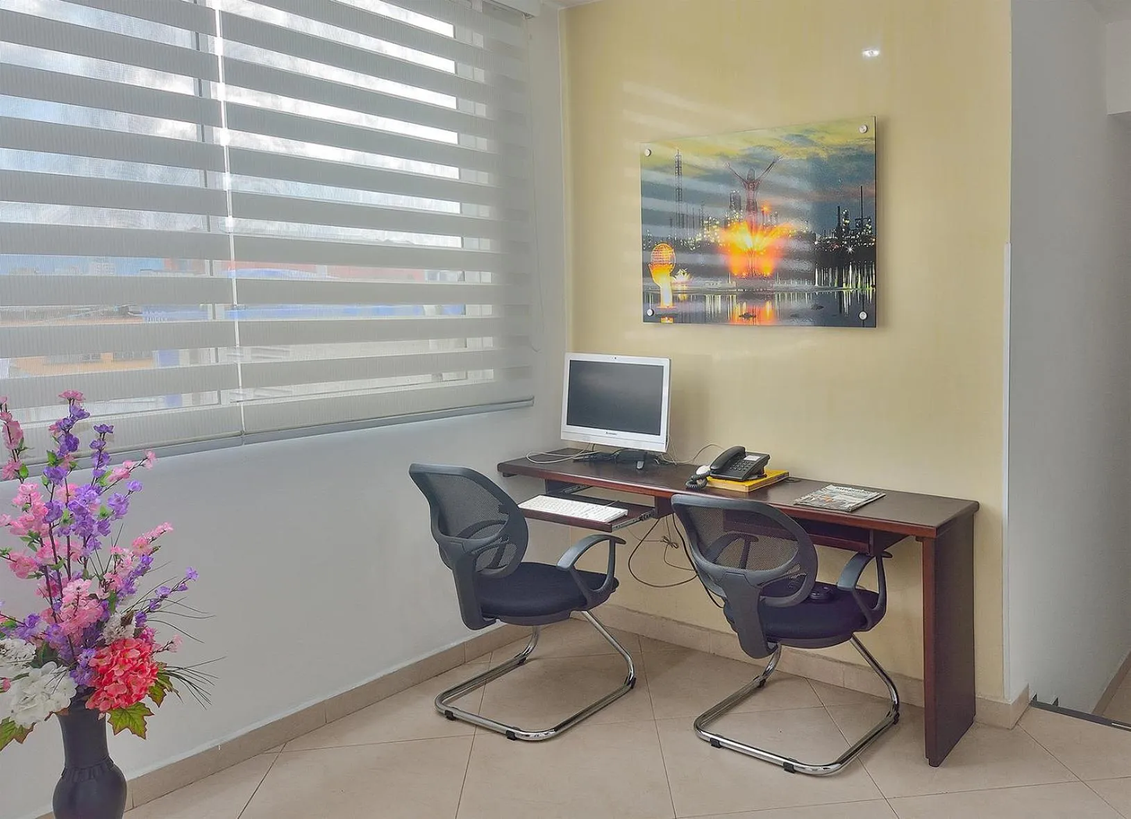 Communal lounge/ TV room in La Pera Hotel