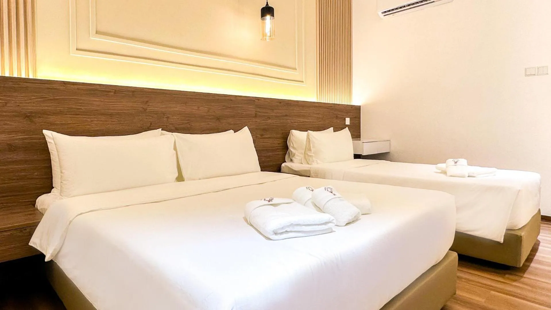 Superior Triple Room in Cottonhouz by Ayuhouz