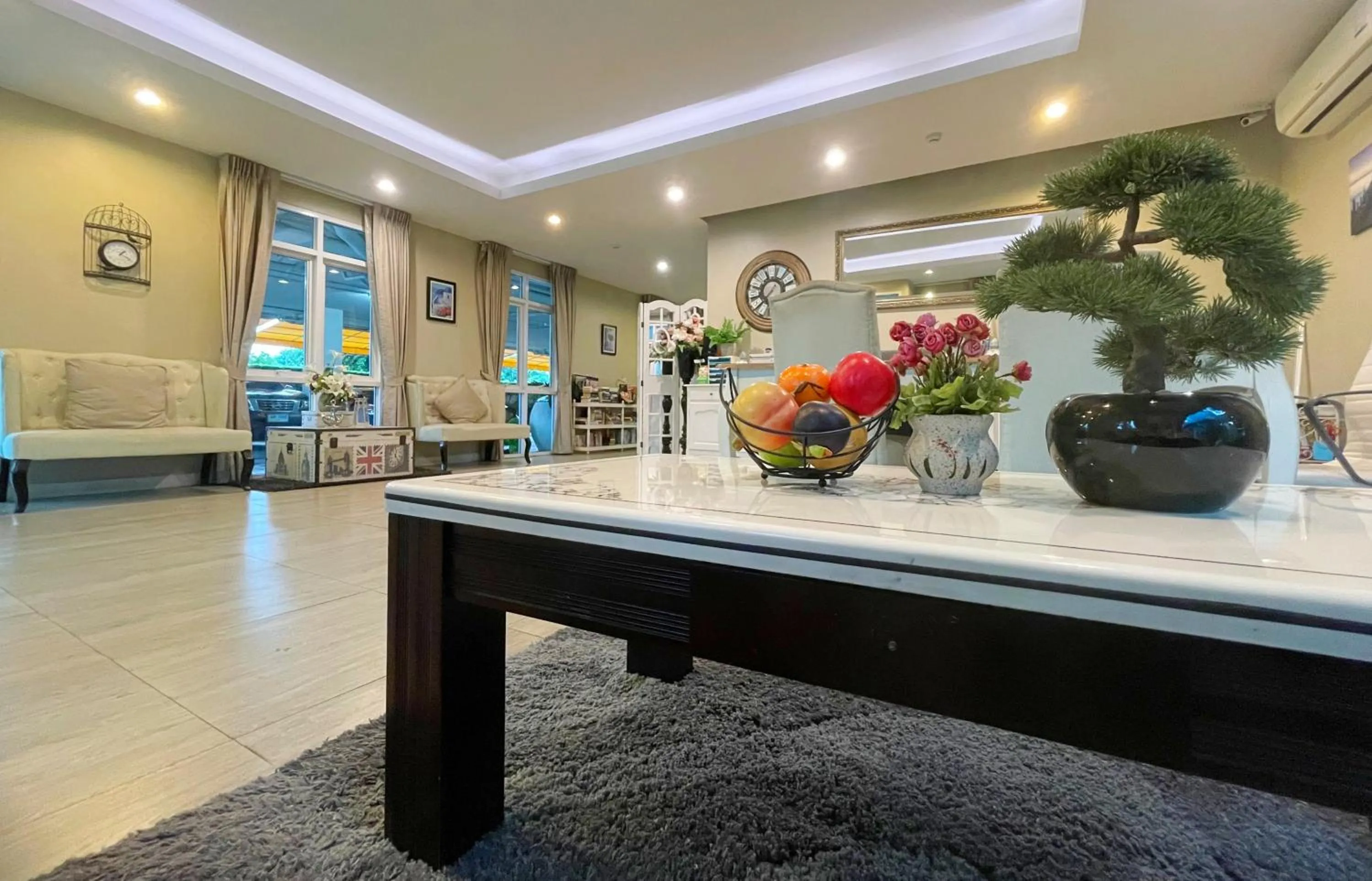 Seating area in Baan Pattaya by Sabai