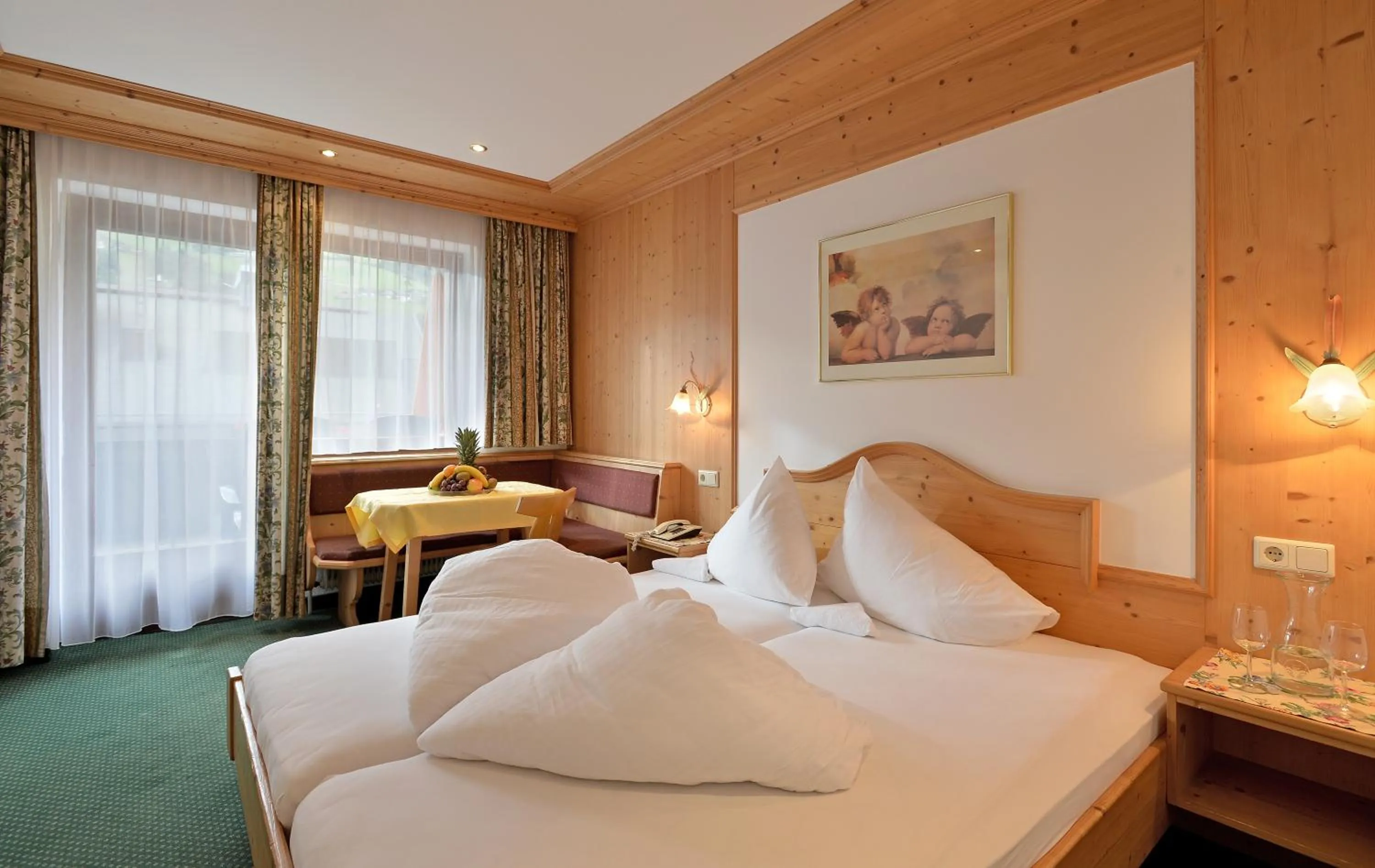 Bed in Hotel Schwarzer Adler