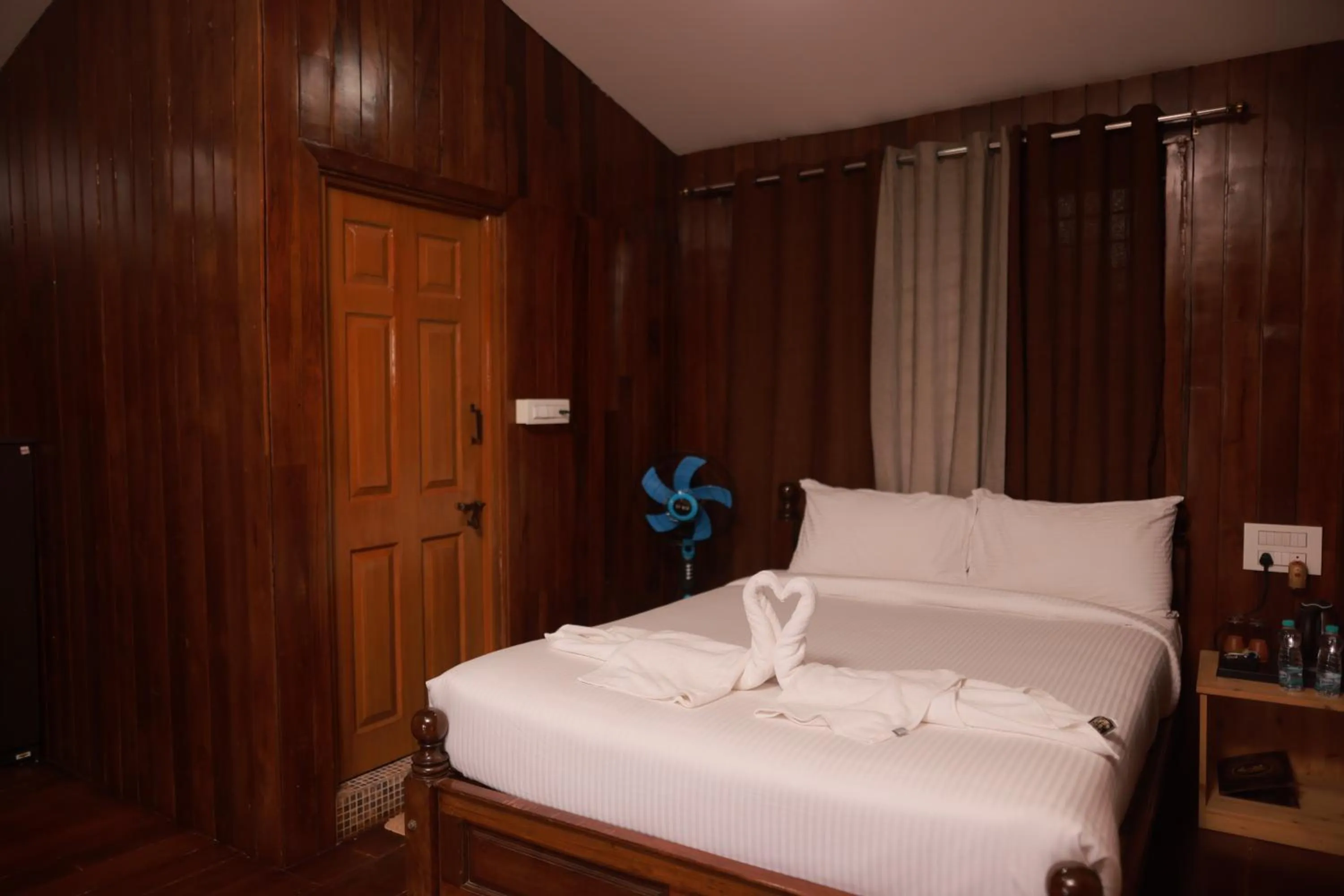 Bed in Coorg Riverness Resort