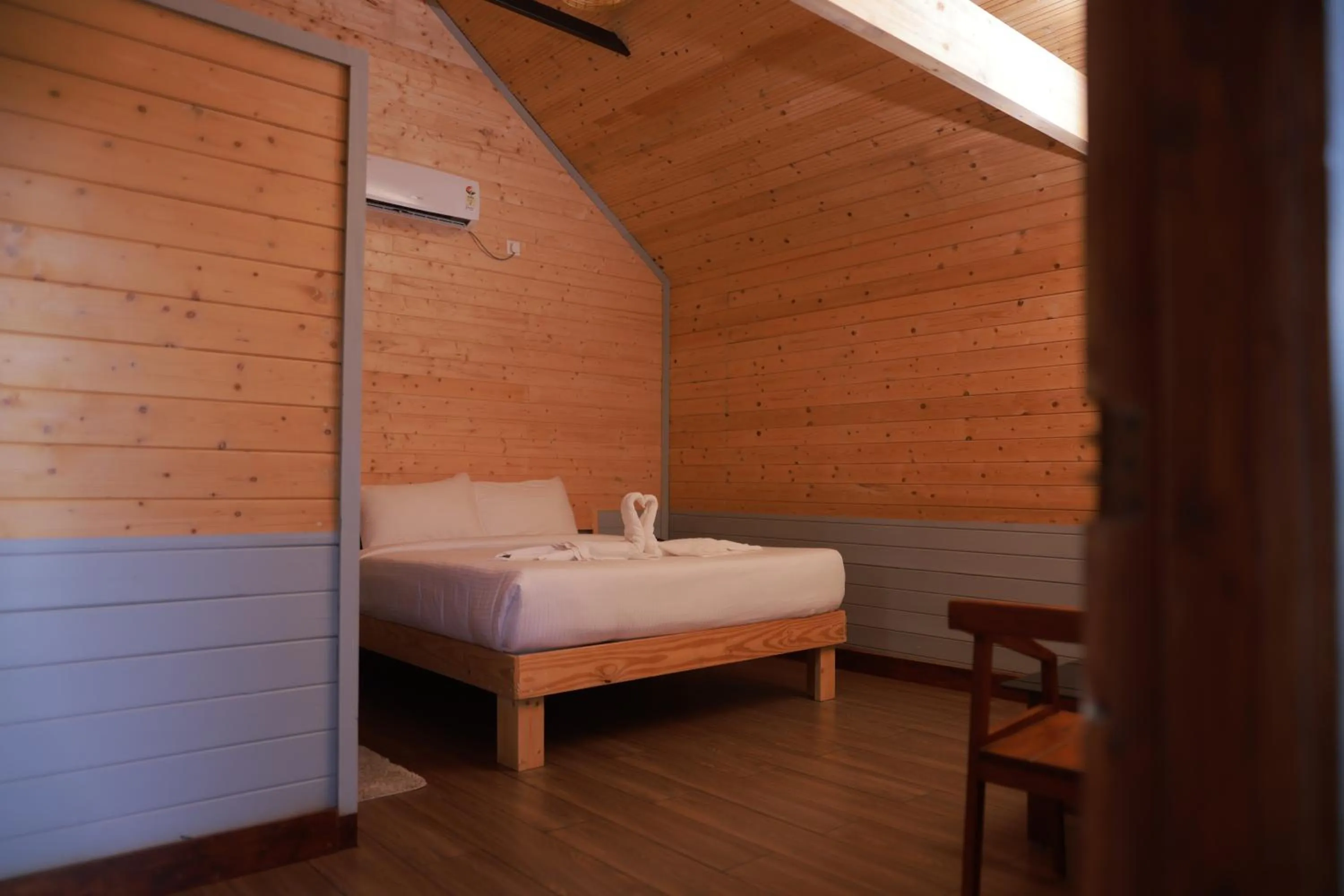 Bed in Coorg Riverness Resort