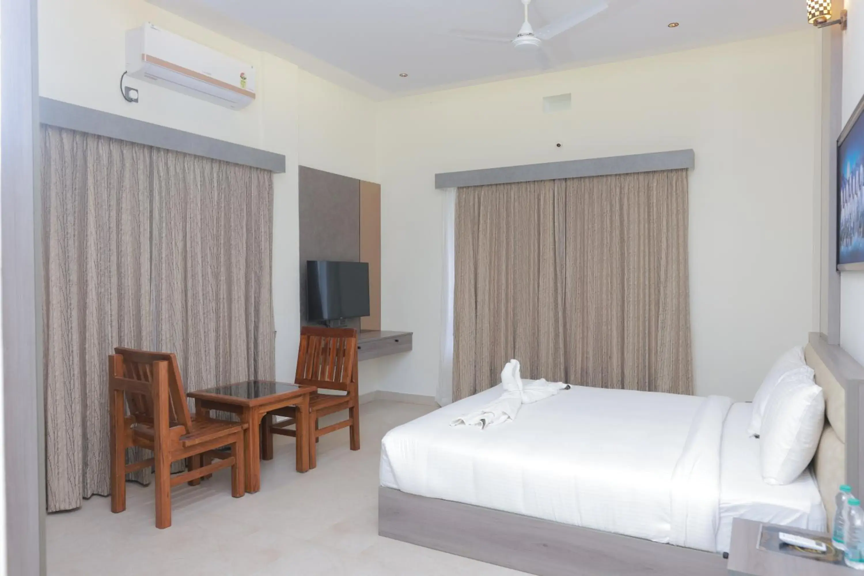 Communal lounge/ TV room, Bed in Coorg Riverness Resort Communal lounge/ TV room, Bed in Coorg Riverness Resort