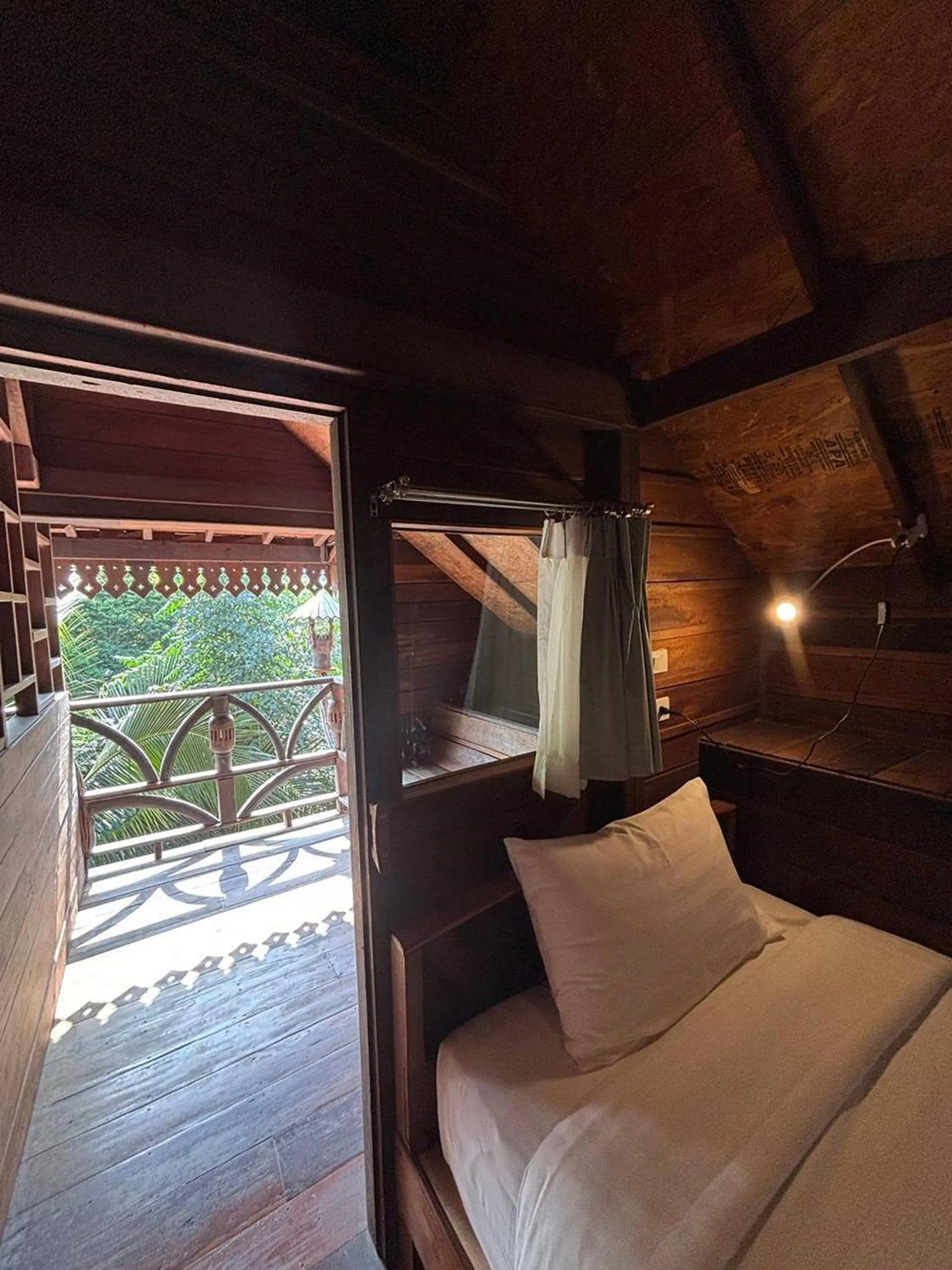 Bed in Boutique Village Hotel