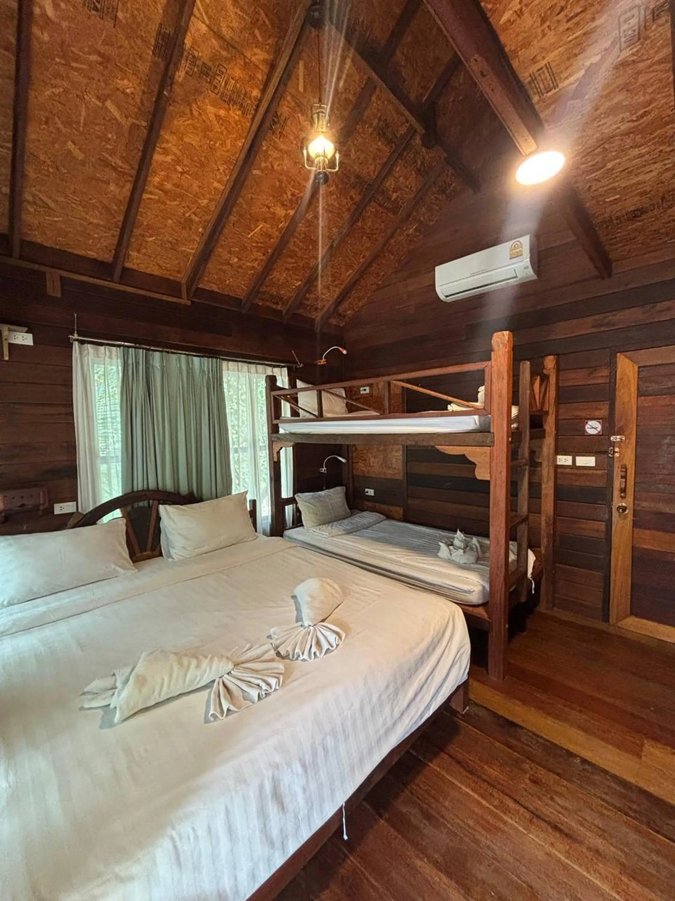 Bed in Boutique Village Hotel