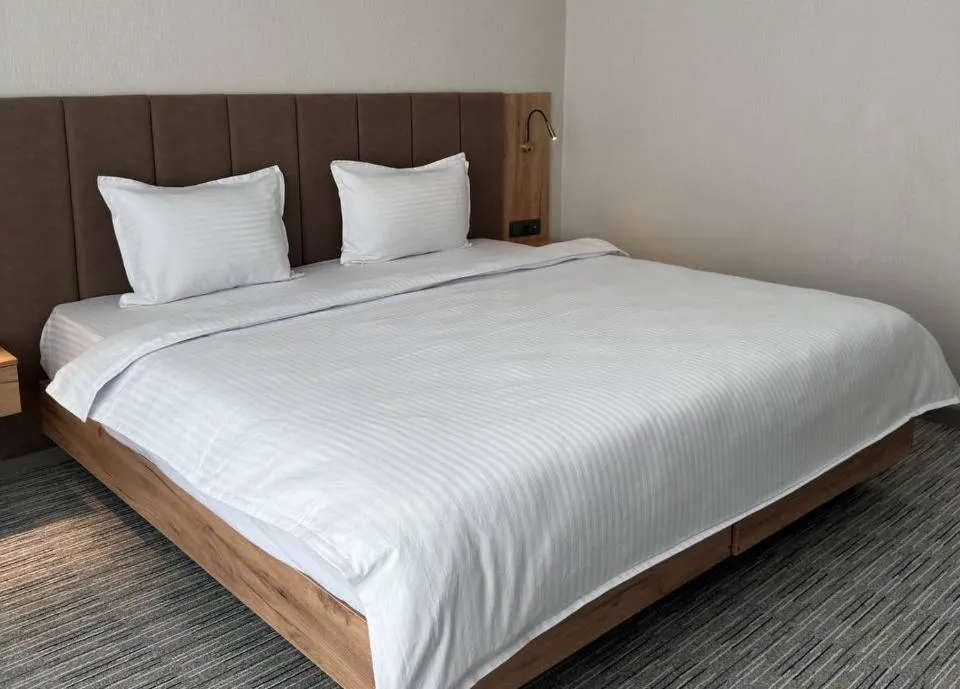 Bed in Reikartz Hanzade Samarkand