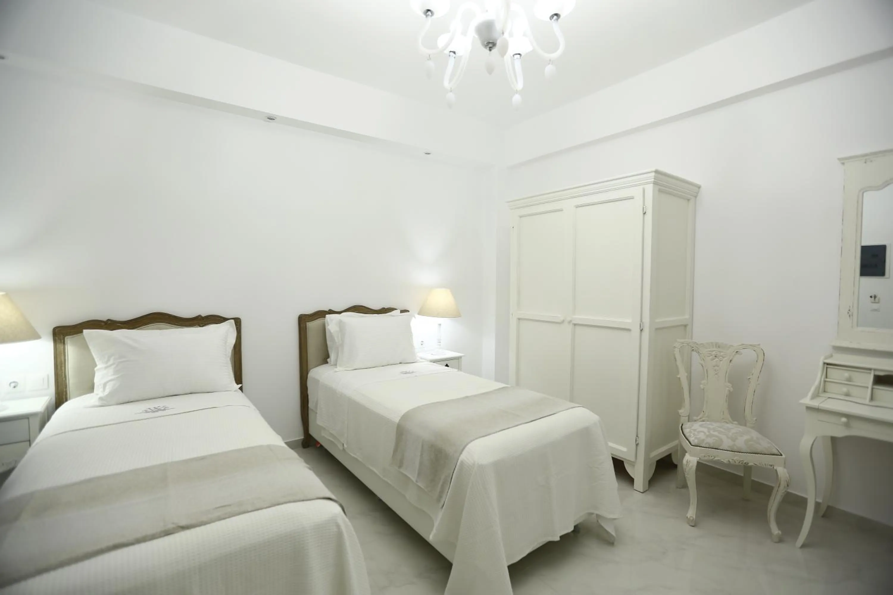Photo of the whole room, Bed in The White Suites