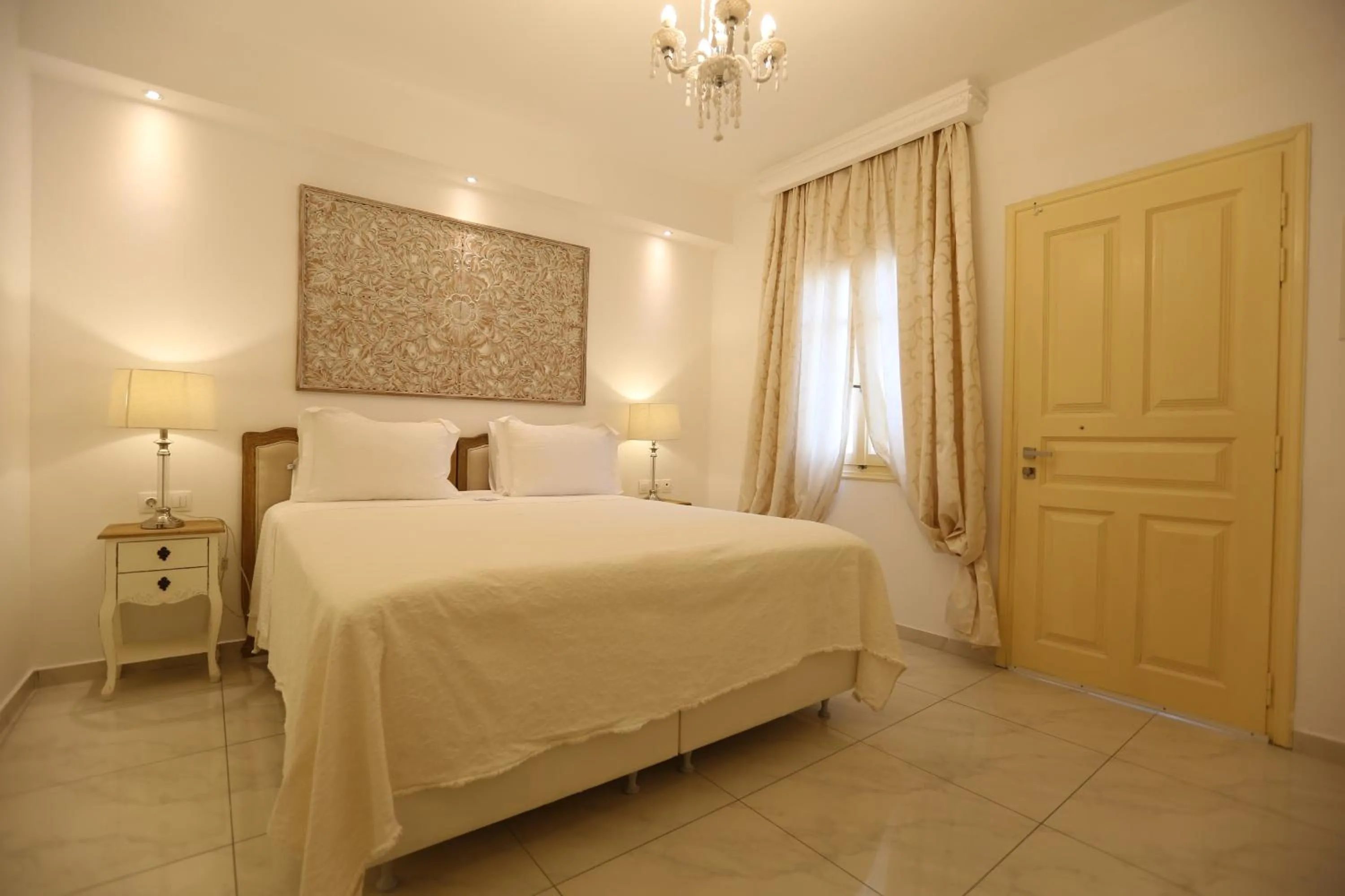 Photo of the whole room, Bed in The White Suites