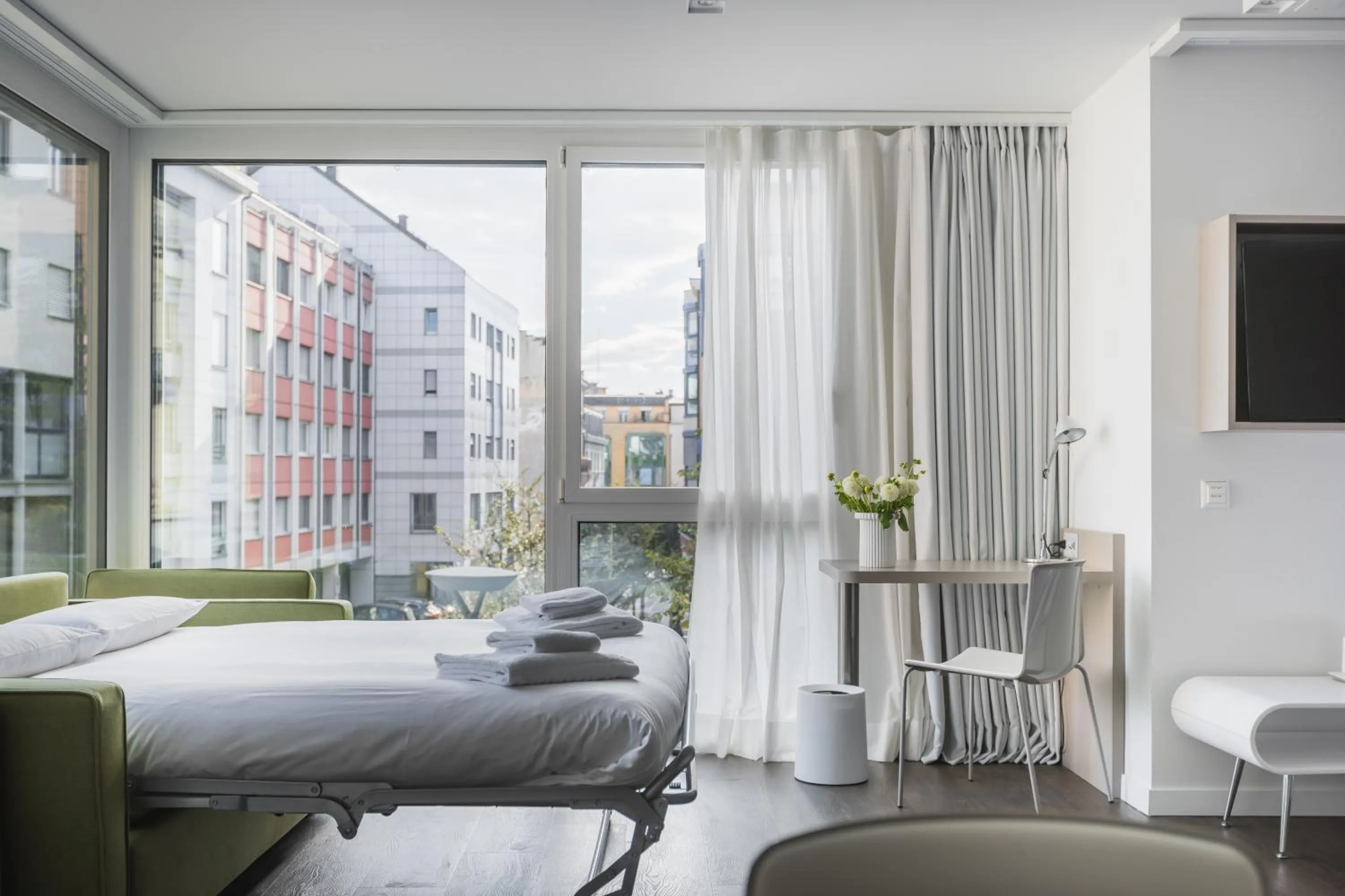 Living room, Bed in Base Nyon