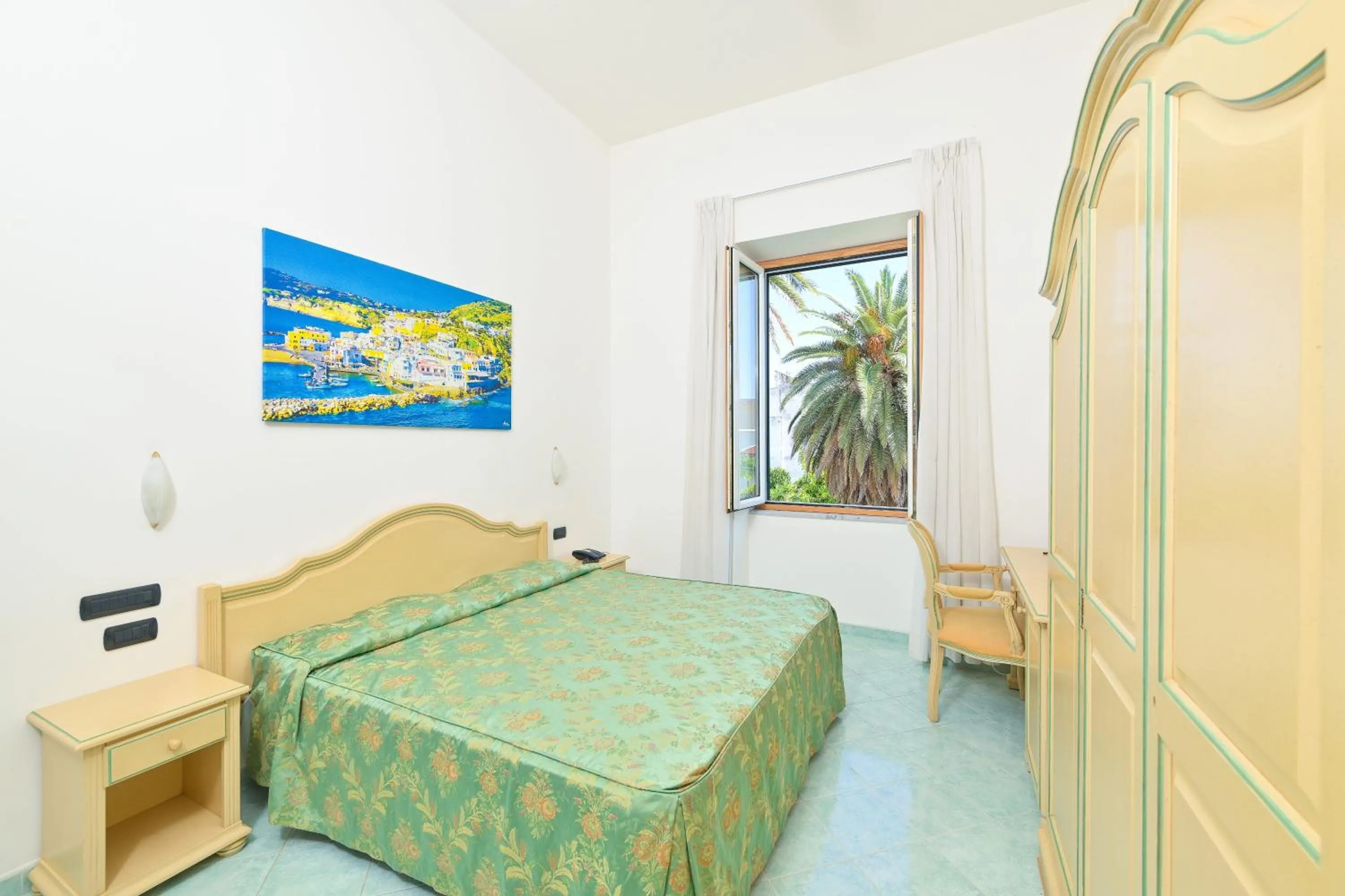 Bed in Hotel Villa Paradiso