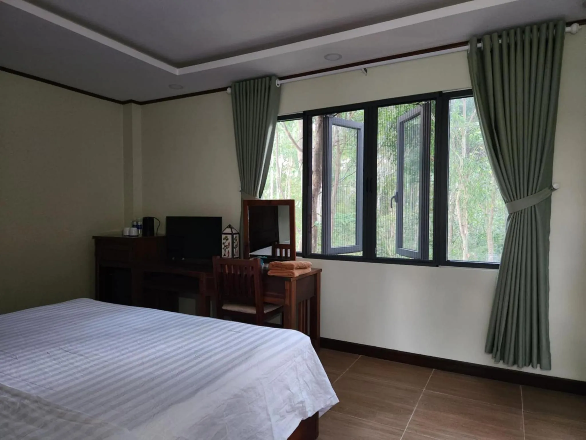 Communal lounge/ TV room, Bed in Vela Phu Quoc Resort