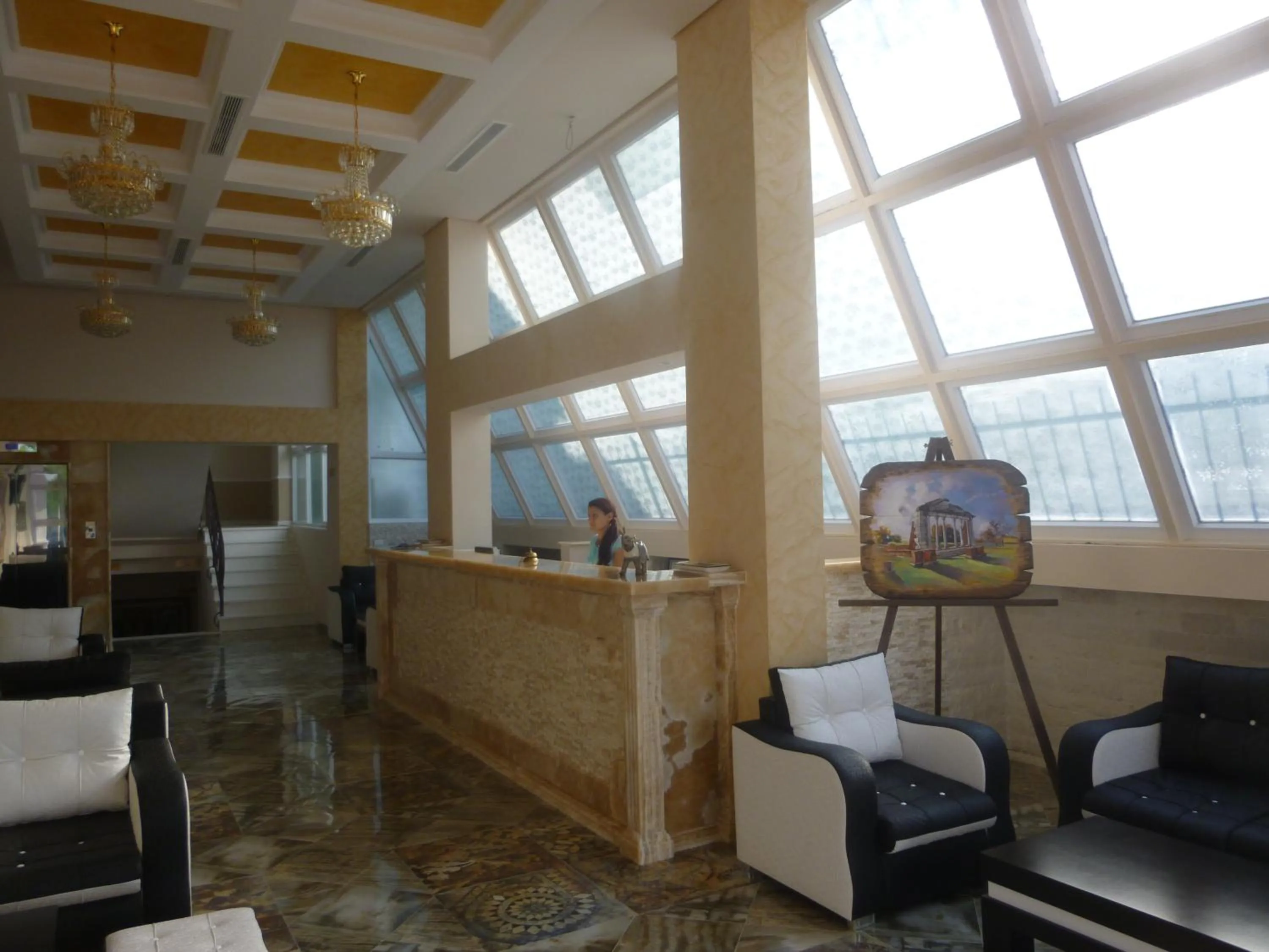 Lobby or reception in Villamaria Hotel