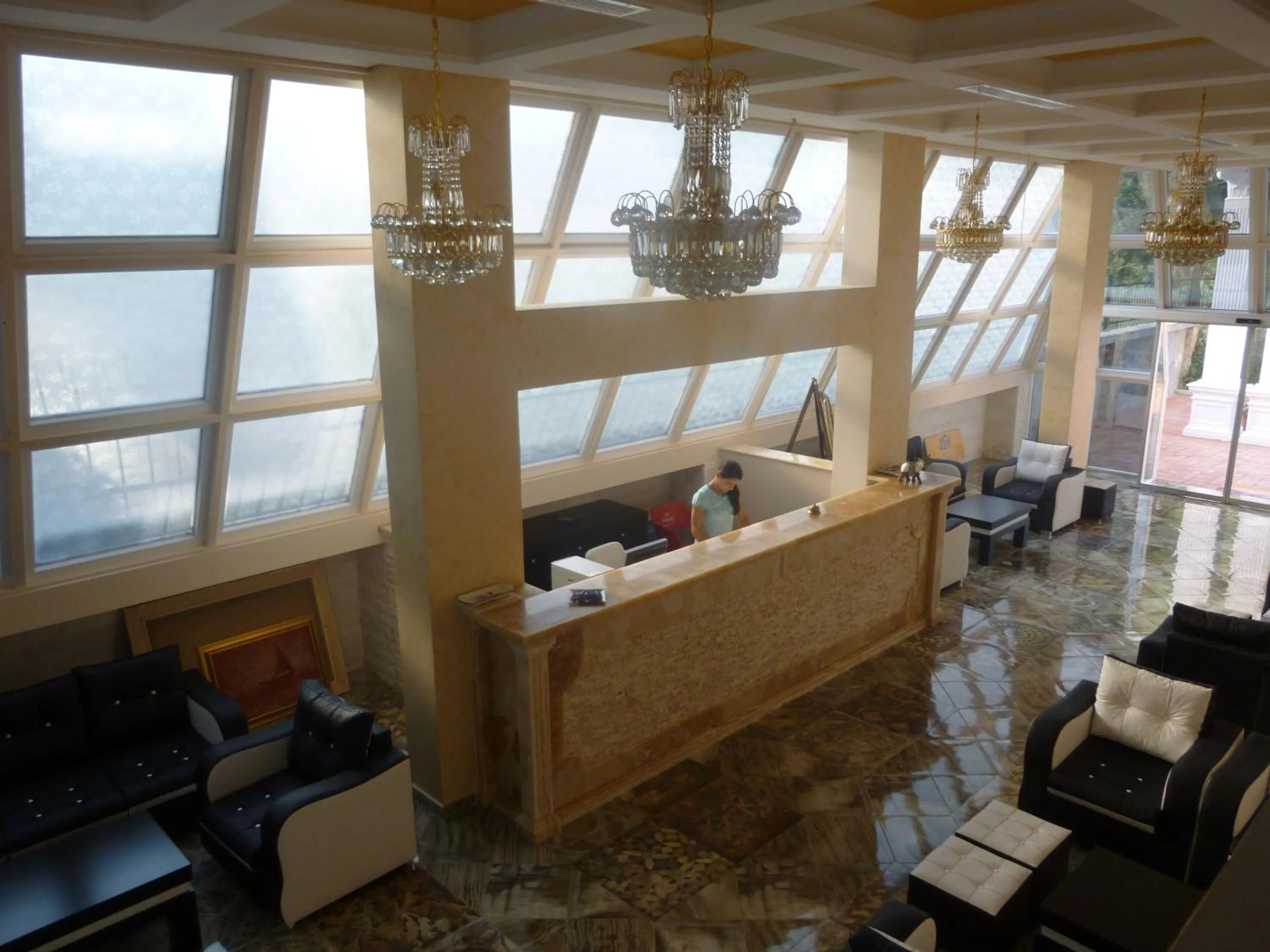Lobby or reception in Villamaria Hotel