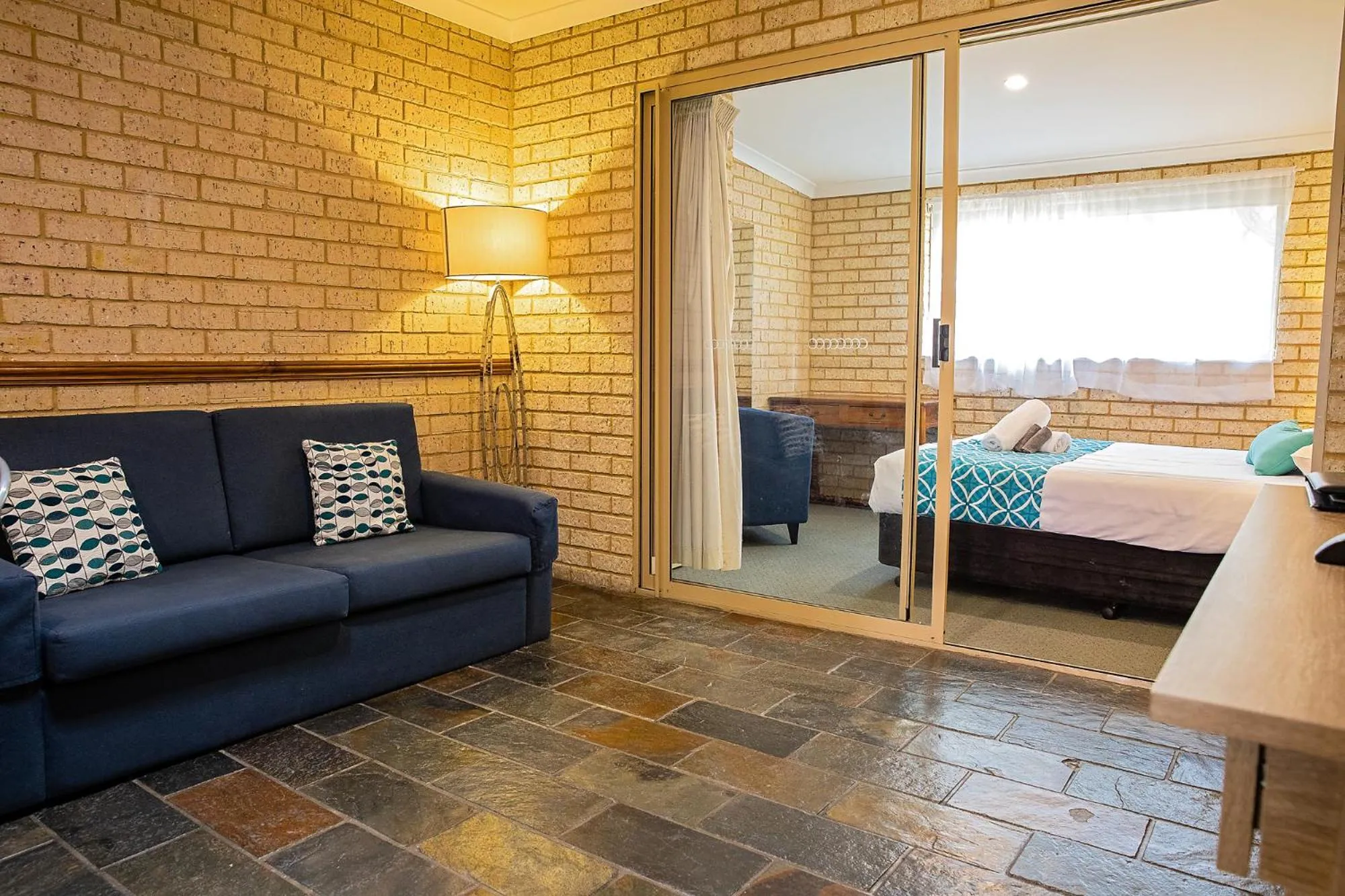 Living room, Bed in Busselton Villas and Glamping Village