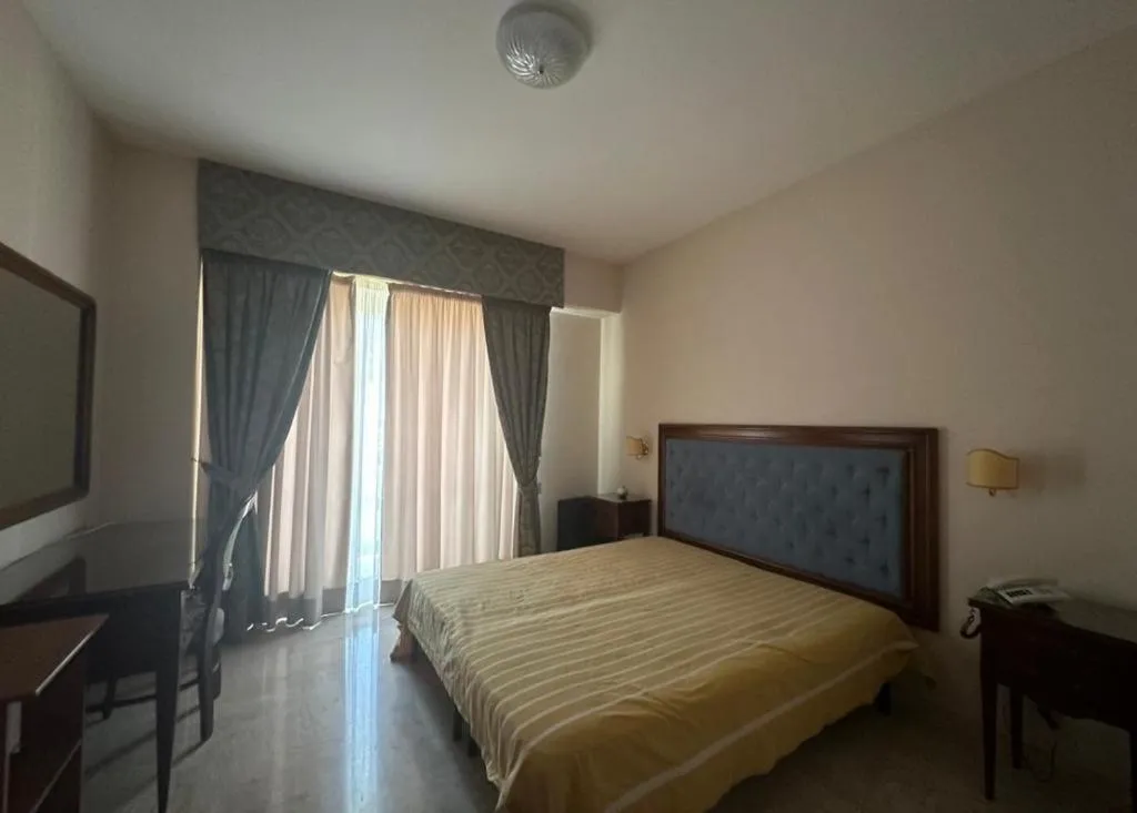 Bed in Mondial Park Hotel